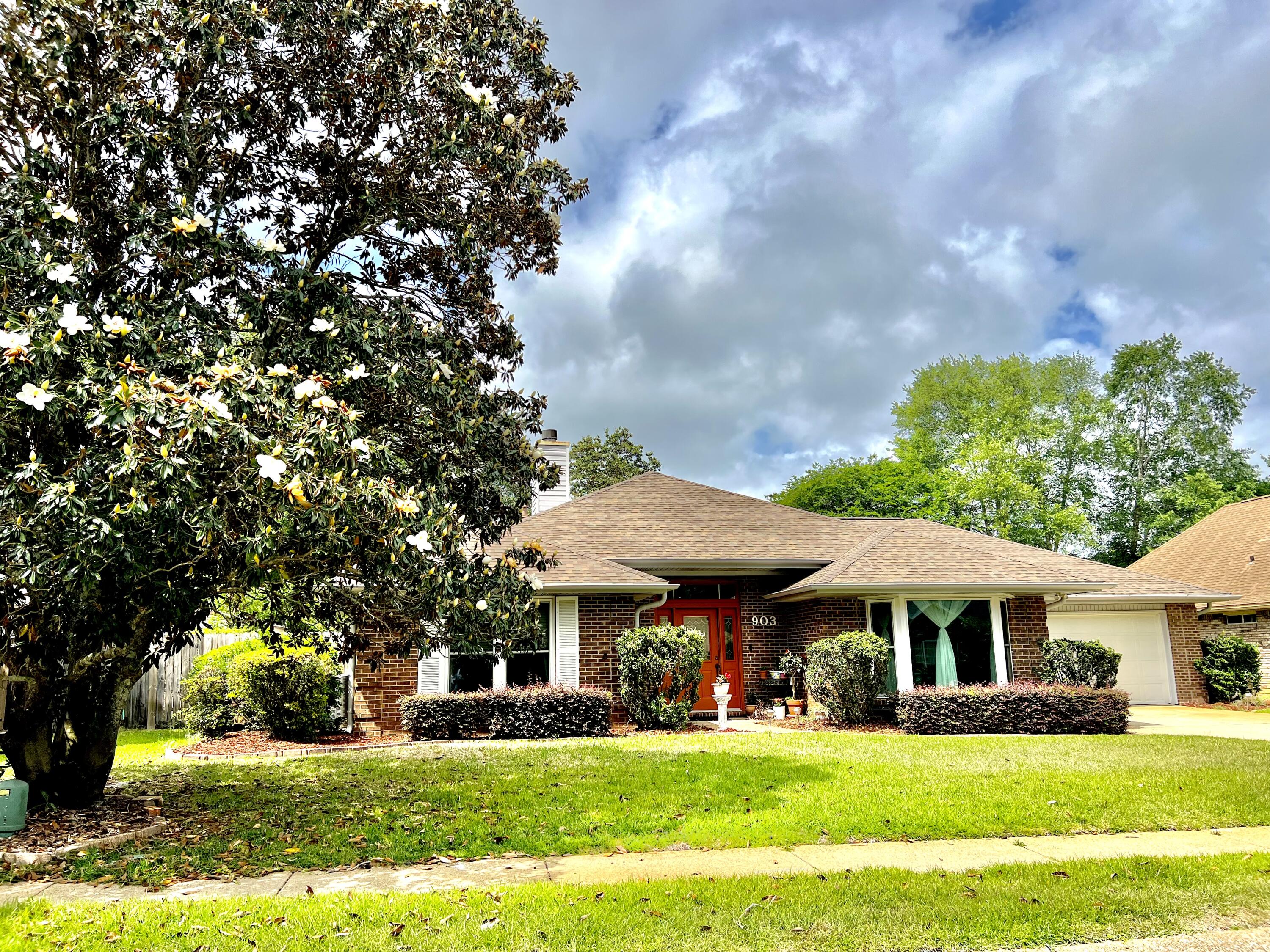 STUNNING!  Impressive and welcoming! This home truly lives large with a wonderful floor plan. The outdoor space adds to the wonderful lifestyle this house has to offer. A 30 ft long screened porch and 289 feet of additional outdoor living space with a wonderfully manicured and maintained back yard.  Vaulted ceiling, impressive fireplace, GAS range in the kitchen, split floor plan, ample kitchen storage, wonderful flow!  It is truly a lovely home. With the large breakfast area in the kitchen, the dining room can be used as a flex space. This home has a great  flow and is truly lovely  with natural lighting. Brand new flooring and extraordinarily well maintained. This is a wonderful home and one that you will be proud to own! WELCOME HOME!!!