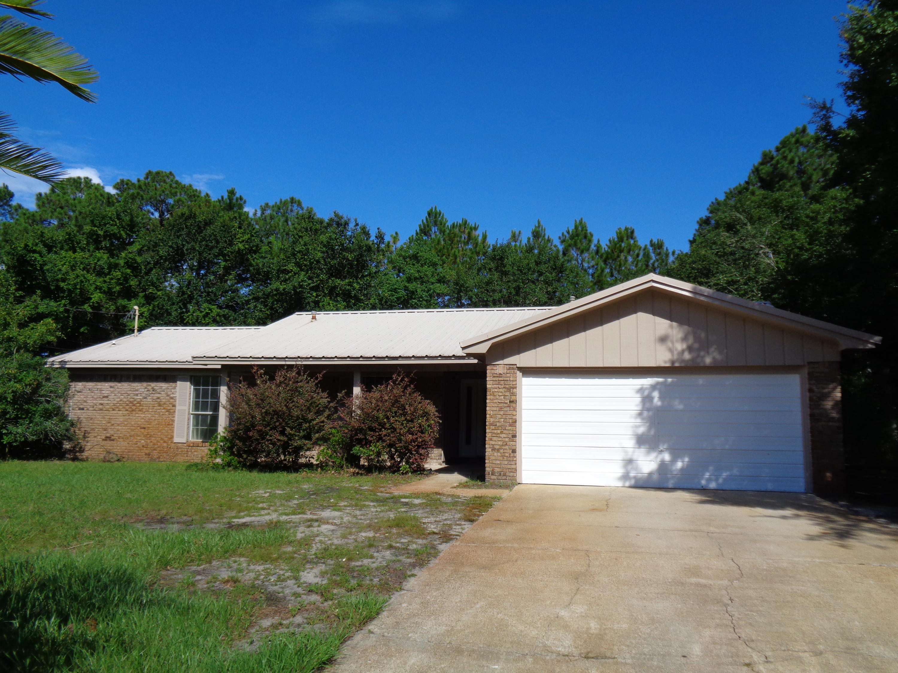 NEW PHOTOS COMING SOON! Great 3 bedroom 2 bath home in Mary Esther! This property has a large living room, fireplace, breakfast nook, and spacious master. IN GROUND POOL! Large shed in back yard. 1564 square feet. This property needs updating but this your chance to make your home your very own! Pool is being ccleaned up and serviced.