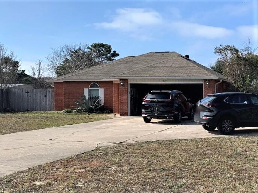 Situated on a 1/2-acre corner lot in desirable Holley by the Sea, is this nicely updated, bright and well kept, 3 bedroom, 2 bath home. Not only do you have vaulted ceilings in both the Living room and Master bedroom, you will also find stainless appliances, solid surface counters, a wood burning fireplace and updated master bath with a fabulous tiled, walk-in shower and marble topped double vanity. Two sets of French doors lead out from the living room to the rear patio and the huge fully fenced back yard and workshop/man cave/she shed!Home is on public sewer, has underground Utilities & Solar panels, which will be paid off at closing by the Seller.The home is occupied by tenants, in person showings are limited. Please check out the 3d Virtual Interactive Tour. Lease expires 9/30/2022