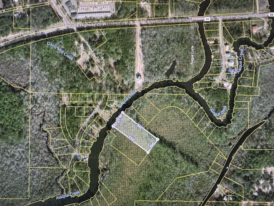 This 2 acre parcel is perfect for a fish camp or weekend getaway.  The parcel is only accessible by boat. Portland Boat Ramp is within very close proximity.  Choctahatchee Bay is also accessible from this property.  Property is located in an AE flood zone.