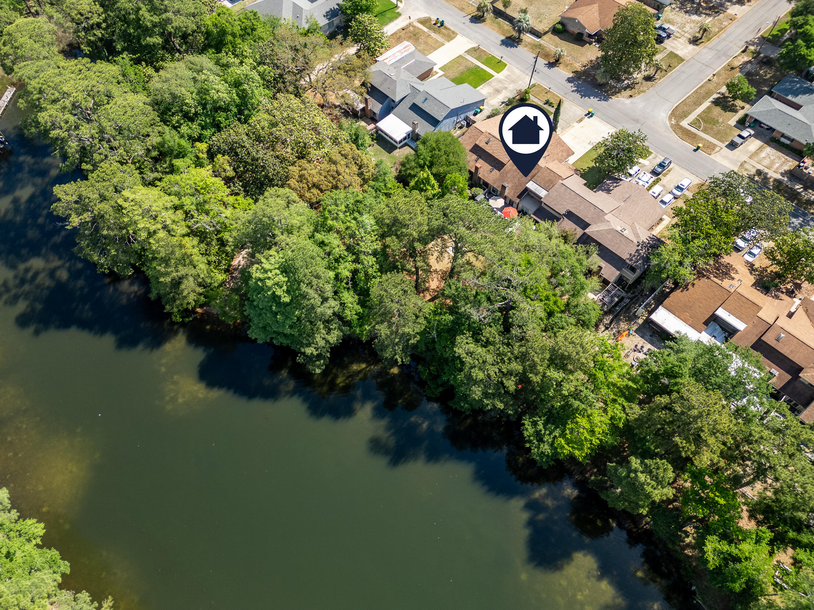 ALL THE JOYS OF WATERFRONT WITH NONE OF THE MAINTENANCE! Fantastic RARE Opportunity. This unit backs up to a City Park with DIRECT WATER ACCESS Maintained by the City of Niceville. NO HOA! Park you boat in the Over Sized Driveway. Boat Launch just steps away. This updated 3 Bedroom 2 Bath Home features a Huge Living Room with a View, Dining Room and Flex Space as well as a Bedroom and Full Bath on the Main Level. Upstairs you'll find the Primary Suite with a Waterfront Balcony and an additional bedroom with HUGE closet and Bathroom. Large concrete patio for backyard living. Firepit adds to the ambiance. Paddle Boards Welcome! 2 Car Garage with Epoxy Floor and Attic Storage. Don't Miss This Your Chance to Live the Coastal Life! Buyer to verify pertinent info