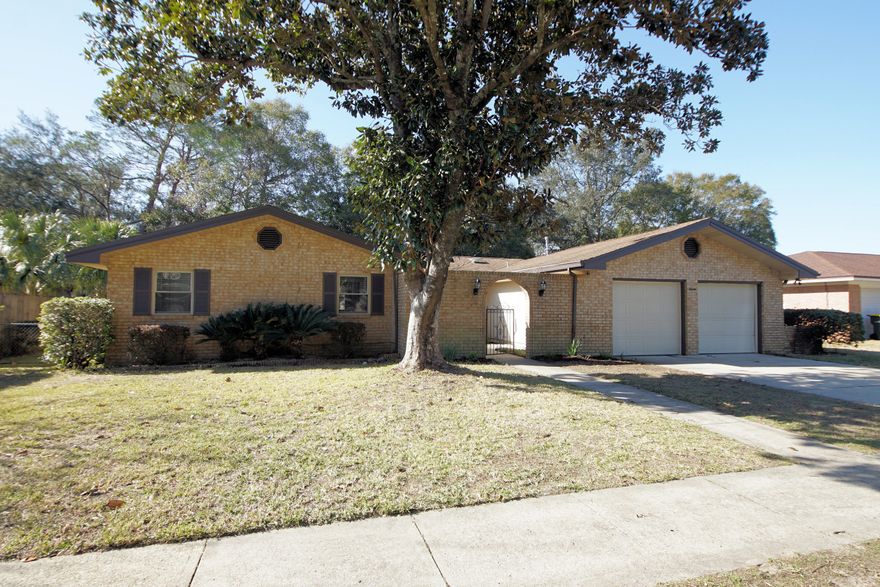 Seller to provide new roof with acceptable offer! Gorgeous home centrally located with 4 bedroom and 2 baths  with 2071 sq ft (1840 sq feet and 231 sq ft Florida Room). This Kenwood Subdivision home is only a few miles to the military bases, beaches,. restaurants, and schools. The homeowners had the home re-wired in 2020 and updated all the light fixtures to include recessed lighting, ceiling fans, sconces, exterior lighting, and smoke detectors. The re-wire included a new electrical panel! The heating and cooling system is 2013 and the hot water heater is new. The home has new luxury vinyl plank flooring  throughout. The kitchen and baths have tiled flooring.
