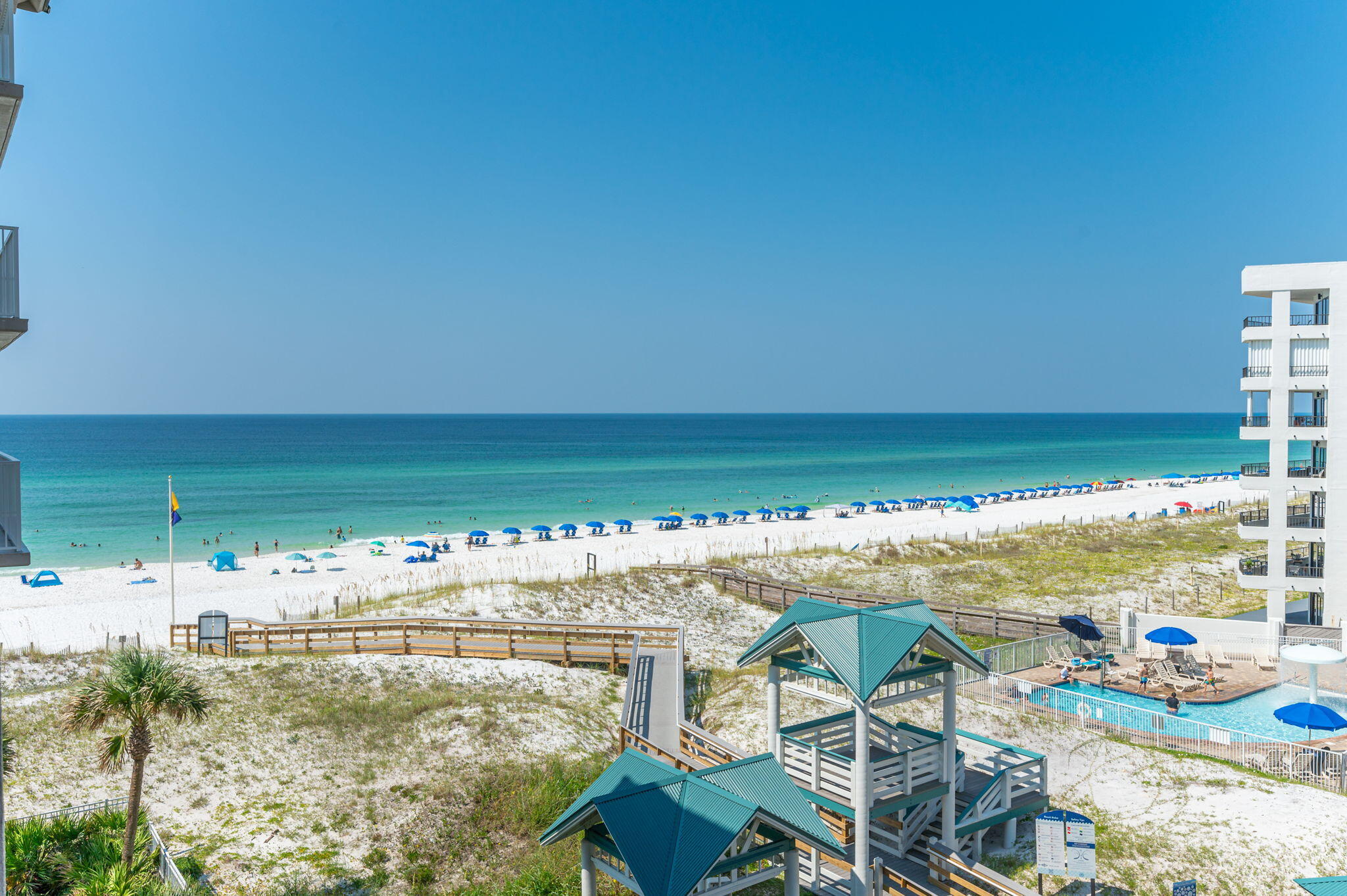 Why dream about enjoying your morning coffee while overlooking the gulf when you can now make it a reality. 3 Bedroom 3 bath beach oasis ready for you to entertain family and guests and turn it into a profitable vacation rental. Seller is willing to leave everything furnished so all that is needed now is you!!! Escape onto the balcony from either the living room or the master bedroom. The master bedroom is oriented just to be able to wake up and look straight out onto the beach gulf! HVAC and appliances replaced in 2017. Granite countertops and new LVP flooring installed in 2023. New dishwasher installed in 2024. Washer/dryer replaced in 2023 as well new motors in all 3 bathroom extractor vents. Some of the condo features include a heated pool, fitness center, and beach access are just some of the amenities. Many fun attractions in the area including golf courses,restaurants, shopping centers.Beach service and one assigned covered parking spot are included.