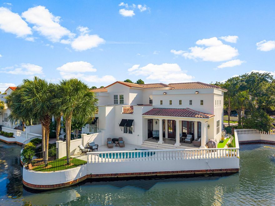 Welcome to this exceptional two-story villa in the exclusive community of Fountains at Sandestin--where serene lakefront living meets refined luxury. This recently renovated Jewel is perfectly positioned to capture sweeping views of the lake & Golf Course, offering a lifestyle of comfort, elegance, & tranquility.Step into a welcoming front entrance with travertine flooring & soaring 18-foot ceilings with clerestory windows create a dramatic & light-filled living space. A wall of glass doors frames stunning vistas of the lake & fairway, seamlessly blending indoor & outdoor living. This villa is ideal as a primary residence or a second home, with no short-term rentals permitted, ensuring a peaceful & private oasis! Just a short stroll away, discover many vibrant boutiques & restaurants.