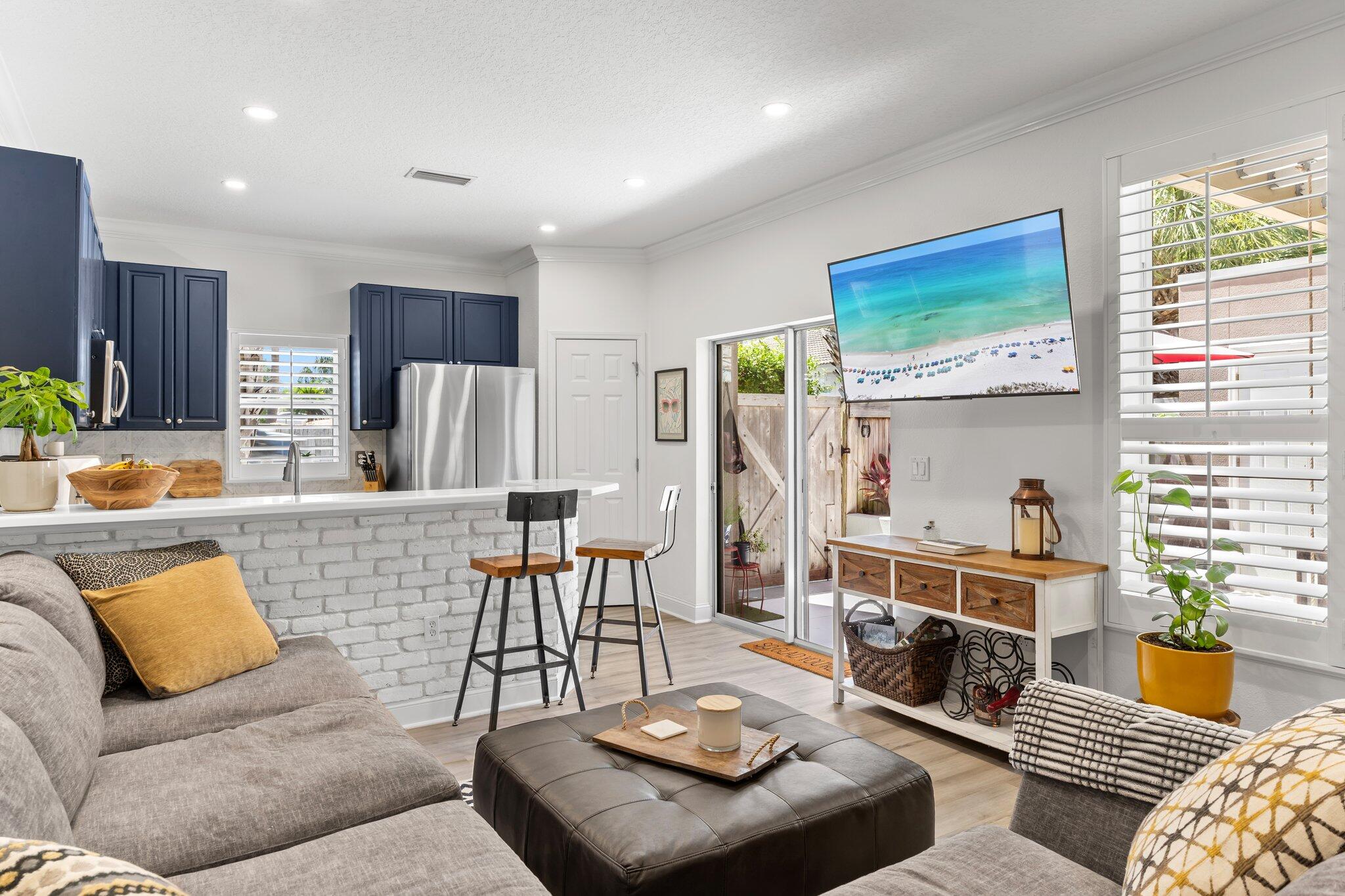 Live the beach life in this, RARE FIND ALONG SCENIC 98 with deeded beach access just minutes away. Gorgeous, private courtyard greets you with an outdoor shower and oversized closet for all your beach gear. You'll find the main living area, kitchen, dining, on the first floor. Upstairs there is luxury vinyl plank flooring with two updated large bedrooms with en-suite bathrooms, a laundry room, and private balcony, where you can enjoy the sea breeze. Beach Pointe is a great place to own with a community pool, and a private beach access just steps away. Two assigned parking spots with extra parking for your guest. With excellent rental potential, this residence would make a fantastic investment property!