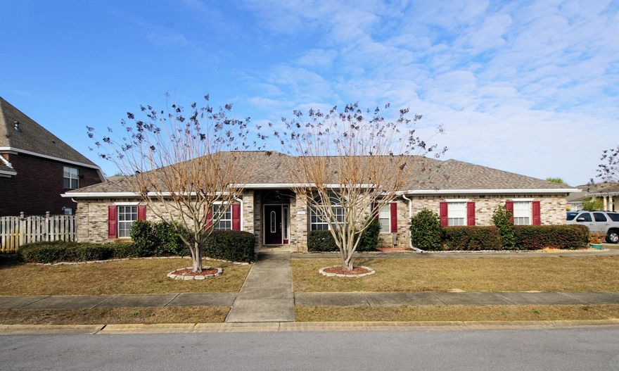 Beautiful open and airy, all brick, 3 bedroom 2 bath home with light oak wood flooring throughout. Granite tops in kitchen area. Formal entryway with curved columns and formal dining or use the space as an office area. Large master bedroom with separate shower and jacuzzi tub, double vanities and large walk-in closet. Split bedroom plan. Breakfast nook overlooking the backyard. Laundry room with utility sink is convenient to the garage. The outside covered patio is paved and ready for entertaining. Nice corner lot with sidewalks and street lights.Much sought after subdivision, Bridgeport Colony is a gated community offering privacy with a community pool and is centrally located to both Hurlburt Field AB and Eglin AFB, as well as shopping, schools and great restaurants!