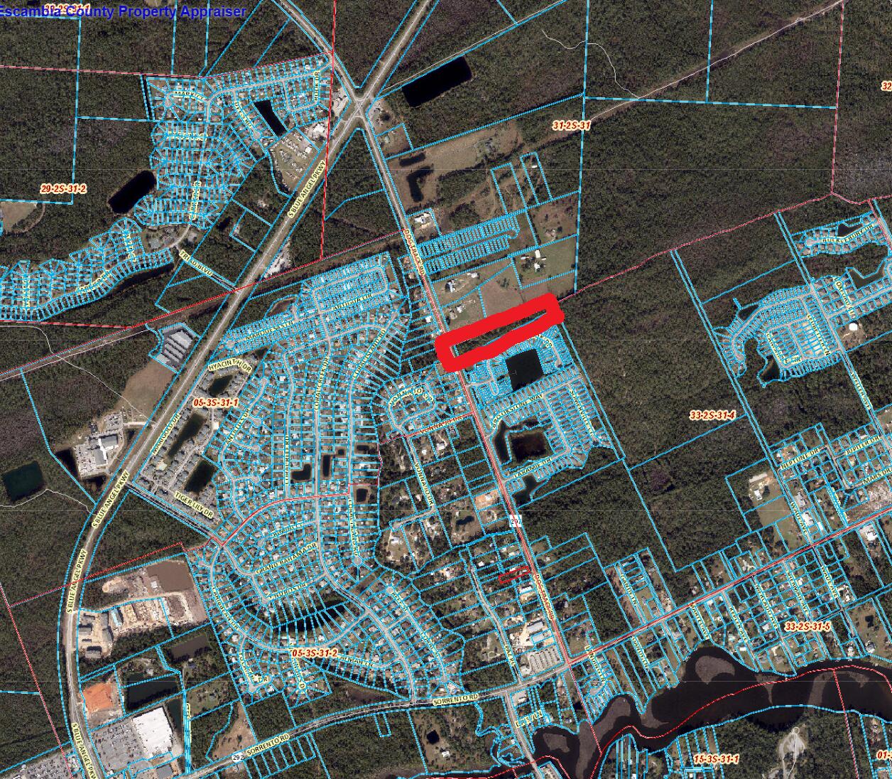 2.4 acres Waterfront with less than 5 miles to NAS, Target and other stores. Approximately 2 miles to public boat ramps. Creek on back side of property. Deer and other wildlife, both pine and hardwood trees present.
