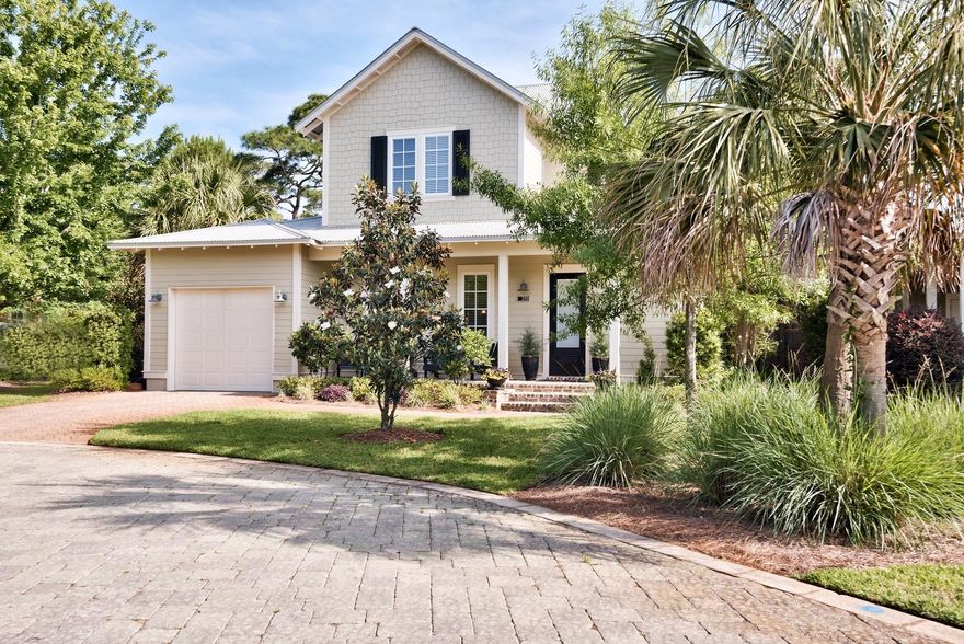 Sunlight dappled by moss-draped canopies of majestic live oak softly illuminates the storybook entrance to Carson Oaks. Stone-paved entry streets pass between stately columns adorned in creeping vine, connecting with a loop of only 65 homes gathered around a park like common area and neighborhood pool. The location of this Florida cottage-style home on a small cul-de-sac within the neighborhood gives it unique curb appeal. The exceptional interior finishes include neutral stone floors that carry throughout the open first floor living areas, contemporary base, crown, and casement moldings, recessed lighting, granite slab counters, and stainless steel kitchen appliances. Off the kitchen is a comfortable, fully-screened outdoor living room. Conveniently located on the first floor, and private