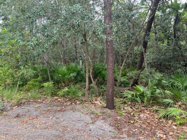 Gulfview Heights lot available in growing development a couple blocks from the beach! Located towards the end of a dead end road which offers additional privacy. This parcel can also be combined with Lot 9 (under a separate MLS) which would be a combined almost .4 acres.