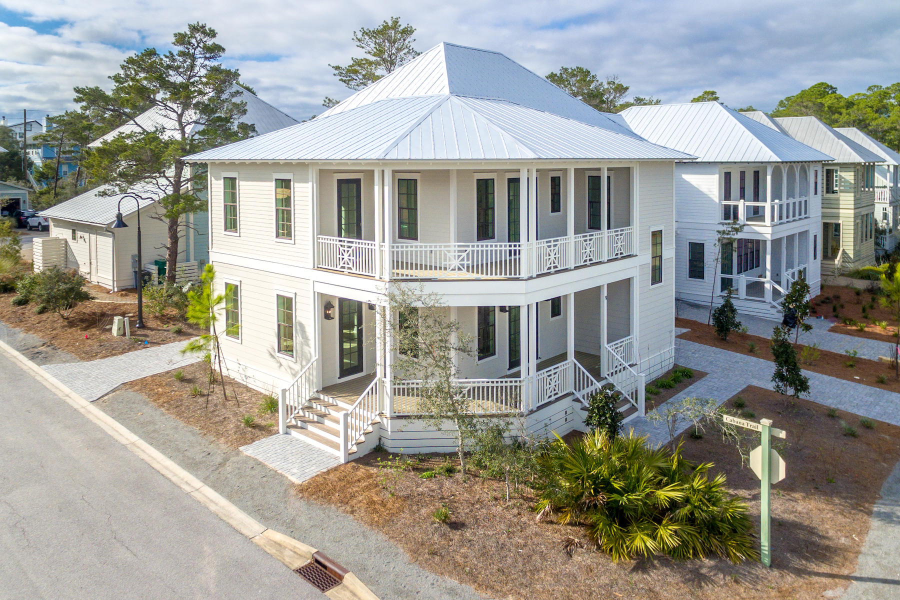 Located in Blue Mtn Beach, this stunning, new, 4 bedroom, 4.5 bathroom home is a short walk to the the sugary sands of the Emerald Coast. Open concept living at its finest, living and kitchen on main and additional bonus area up, so all can spread out! Each bed has its own bath. Features include: granite (kitchen), quartz (bathrooms), hardwood floors, stainless appliances, hurricane impact doors and windows, and an amazing large bunk room. Easy access from US Hwy 98 and 30A, just north of 30A. Corner lot lends itself to ample parking on both sides of the home.
