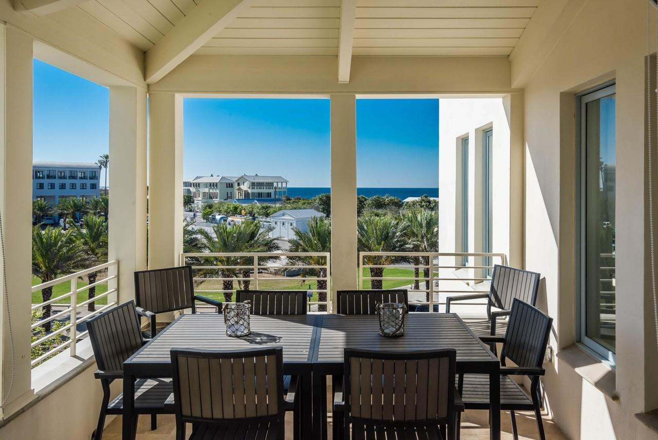 2019 Rental Income of over $164K! With all that Seaside has to offer, picture yourself basking in the middle of the action from this luxury condo with Ampitheatre and Gulf views. Enjoy the many concerts and other performances while sipping cocktails on the privacy of your own balcony. Literally steps from fine dining, shops, pools, tennis and the beach, everything you need for a perfect vacation is here. With sleek, contemporary lines and decor, luxury awaits. Light filled living/dining, 4 bedrooms, chef's kitchen with Wolf/Subzero & high end finishes including limestone flooring and mahogany cabinets. Unit is accessed via a private elevator for 2nd/3rd floor units only. Two reserved parking spaces. Come be a part of the best of 30A!