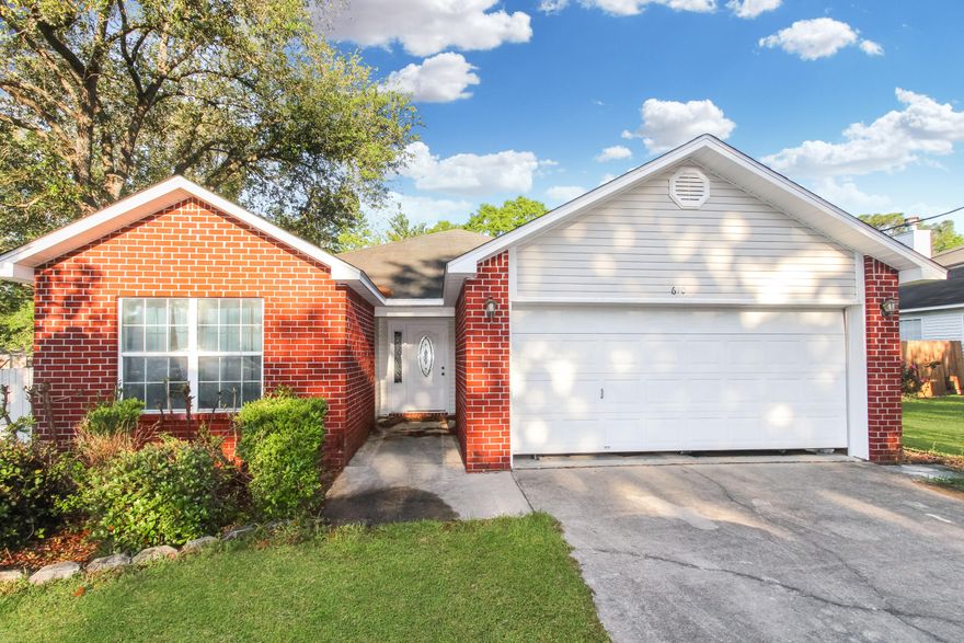 3 Bed, 2 Bath All-brick Fort Walton Beach Home.Walk up your double wide driveway and notice the brand new roof and all brick construction of your new split floor plan home. Upon entering, note the tray ceilings in the living room and the open access to the kitchen and dining area. To the left of the entrance is a hall with access to the first bathroom and the two bedrooms complete with ceiling fans. Through the living area, a breakfast bar separates the formal dining area from the kitchen, which features a stainless-steel Samsung refrigerator, Whirlpool dishwasher, vibrant white cabinets, and access to the double car garage. Off the back of the dining area is access to a screened Florida room. which steps down to a patio and large backyard complete with privacy fence.