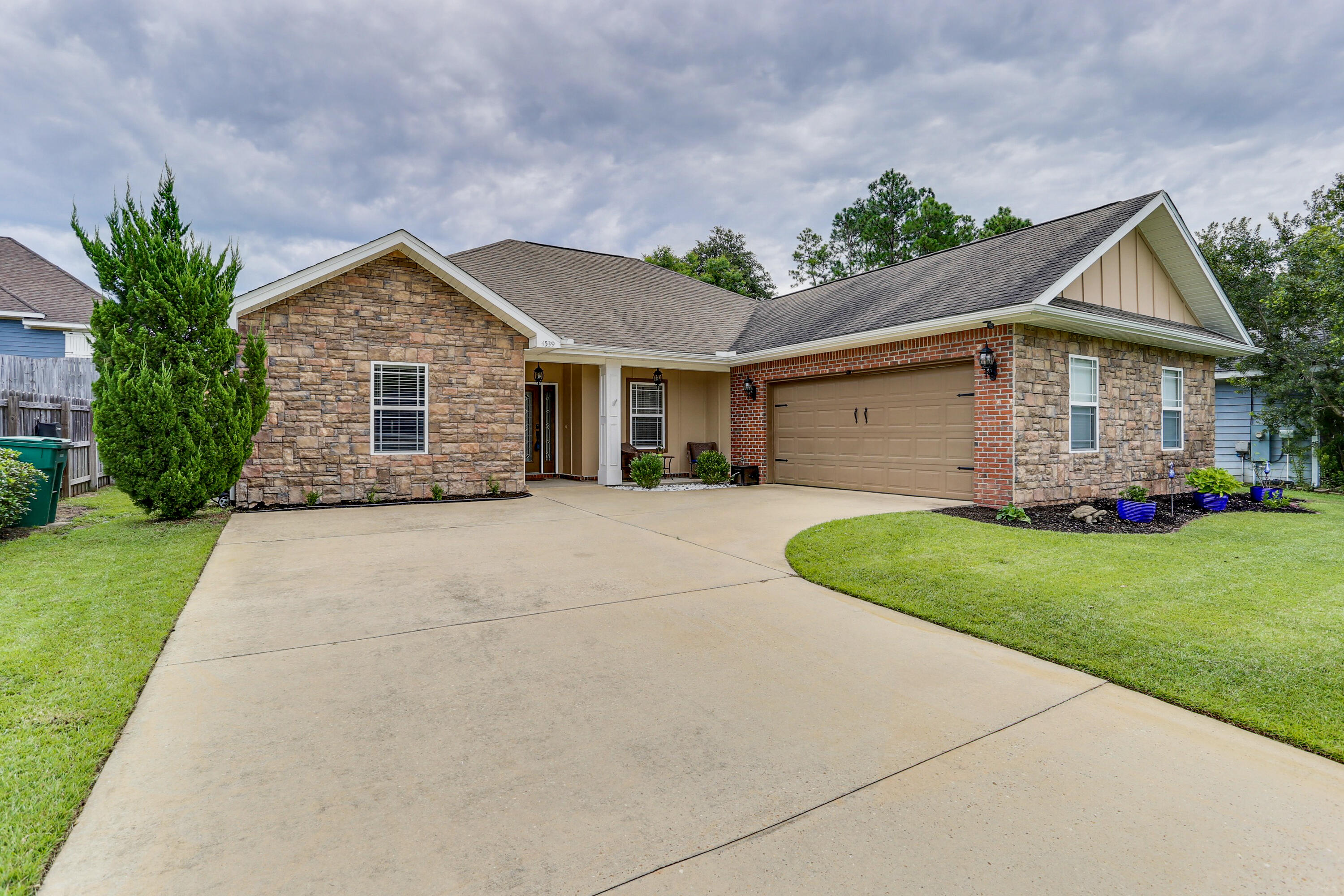 Duggan Pond is a small neighborhood extremely south in Crestview which means easy commuting to and from both Eglin AFB and 7th Group. This house expands nearly 2100 square feet with 4 bedrooms and 2 full bathrooms under its roof. There is laminate and tile flooring throughout much of the walkable space and tile flooring in the kitchen and bathrooms. The master bedroom is abundant and has an ensuite featuring a double vanity, separate tub and shower and a walk-in closet. The back yard is very private and is a perfect place for gathering and entertaining. Please consider this house for your next home.