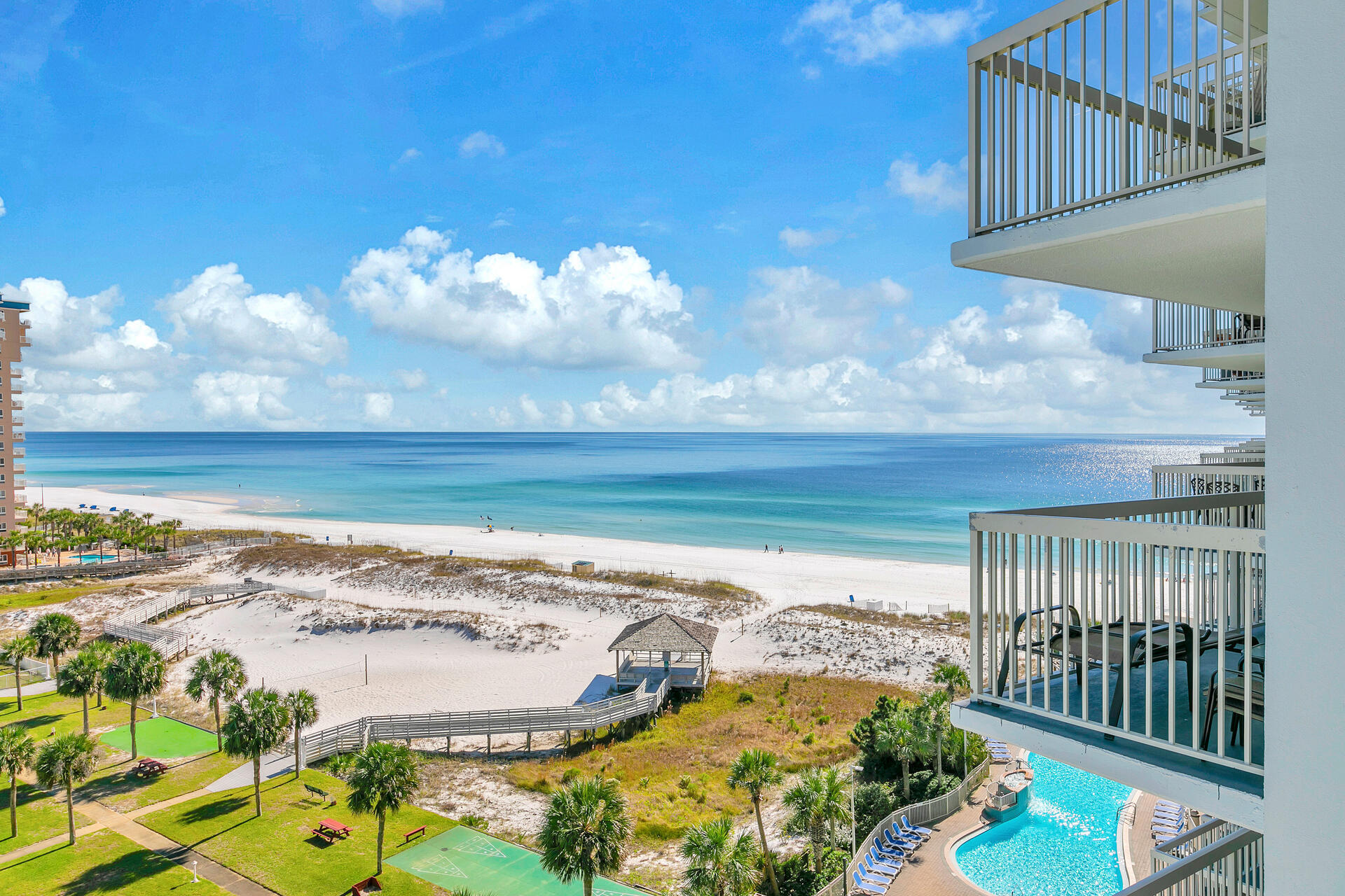 Incredible opportunity to own a 2 bed/ 2bath END UNIT condo at Pelican Beach! Located directly on the famed beaches of Destin...enjoy sun-splashed days of swimming and relaxing before coming home to this super spacious 2 bedroom condo with incredible Gulf views. This beach-inspired condo offers a large master suite with GULF views along with a private bathroom, spacious guest bedroom, guest bath, in-unit laundry, and open kitchen/living room overlooking the gulf. This end unit condo provides prime views from the 9th floor while having additional windows and a corner balcony.  This condo is turnkey, fully furnished, and rental ready! The upgraded kitchen features stainless steel appliances, glass mosaic backsplash, and quartz countertops! Pelican Beach is centrally located to all the dining and entertainment Destin is famous for including spas, shopping, golf, fishing and more! Pelican Beach has an amazing resort style amenities, including: three swimming pools (one indoor), tennis, hot tub, huge sun deck, beachfront grill, fitness center, building security system with cameras, upgraded cable and super high-speed internet, on-site cafe and market, 24 hour reservation desk, convention/meeting services and covered parking garage! This unit is ideal for a beach getaway or investment property! Call to book a private showing!