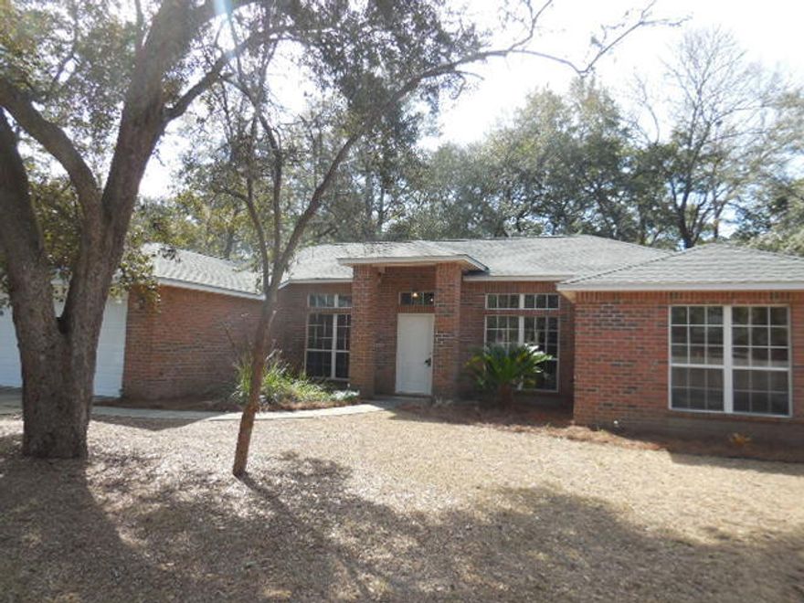 This is a Fannie Mae REO HomePath Property. This Great Home features both a living room and a family room with a fireplace. Plenty of choices of where to eat too: a formal dining room, large eat-in kitchen with an island, or even the screened in patio. The split floor plan features the master suite on one side which includes a luxurious bath with dual vanities, his and her walk-in closets, and a separate shower. The other 3 bedrooms and guest bath are located on the right side of the home. The screened in patio, opening off of the large family room, leads you to a huge backyard. Finish this lovely home off with a laundry room and a 2-car garage! NEW ROOF, CARPET/VINYL, PAINTING INSIDE AND OUT, APPLIANCES!