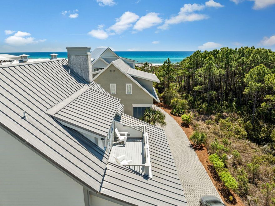 LOCATION. LOCATION, LOCATION - South of 30A in Watercolor: Positioned along WaterColor's exclusive Park Row and bordering the serenity of Grayton Beach State Park, this gulf-front home delivers the rare combination of privacy, space and immediate access to the best of 30A. With sweeping views of both the gulf and Western Lake, this six-bedroom retreat is just steps from the Beach Club, Fish Out of Water and Town Center - yet tucked away enough to offer the quietude expected from a high-end coastal escape. Designed with both elegance and ease in mind, the home unfolds across three thoughtfully planned levels. The open-concept main living area on the second floor features soaring ceilings, a custom Tabby fireplace and an expansive porch perfectly positioned to catch the gulf breeze and glowing sunsets.

A chef's kitchen with Sub-Zero and Wolf appliances, premium finishes and seating for eleven offers the perfect backdrop for entertaining family or unwinding after a day on the sand.

Two luxurious primary suites, one on the second floor and a more expansive one on the third, each feature private porches, spa-inspired baths and direct gulf views. Four additional guest rooms provide ample space for large families or groups, with flexible sleeping arrangements, including bunks, twins and trundles. Additionally, the home  includes a sand room for rinsing off after the beach and a two-car garage. 

Outdoor living is equally considered, with large porches, gulf-facing balconies and a peaceful setting that backs up to preserved green space. Whether you're enjoying a sunset cocktail, walking to the Wine Bar or starting your day with a paddle on Western Lake, the home invites you to experience WaterColor at its most effortless and elevated.

With access to world-class amenities - from the gulf-front pools of the Beach Club to Camp WaterColor, the BoatHouse, tennis center and miles of nature trailsthis Park Row address is more than a beach house. It's a front-row seat to the very best of coastal life.