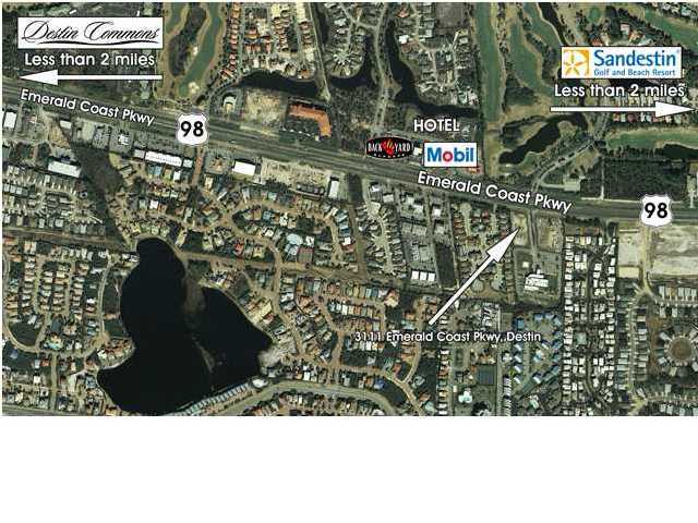 Exceptional corner site and 1.60 acre outparcel approved for up to 20,000 sf located directly South from McKaskil's Jewelers. Concurrency is secured and retention is already in place. This parcel is related to the Paradise Retreat PUD. Please click on main image to view site plan and survey. This is one of the most cost effective development sites in Walton County that will offer the quickest development opportunities!