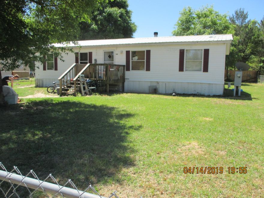 Well kept manufactured home in Oakwood Hills. Yard is completely fenced with chain link fence.Buyer to verify any important information.