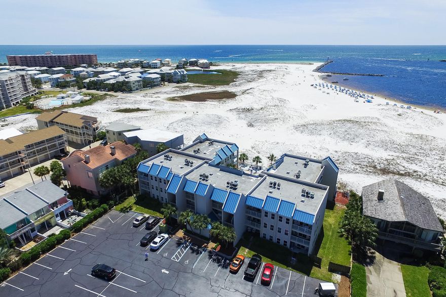Welcome to a Holiday Isle GEM in Destin, Florida! This two bedroom, two bathroom, 2nd floor condo at Poolside Villas is just what the Doctor ordered. Surrounded by a gorgeous setting including the Destin Harbor and Destin's East Pass. It's hard to find more perfect beaches and a more serene environment for relaxing under the Florida sun or playing in the Emerald waters of the Gulf of Mexico. Poolside villas is a gated 30 unit low density development offering owners and guests great privacy with a gorgeous pool area nestled right on the beach access. This complex affords owners a variety of options with privacy that make it a great primary or second home but also the ability to produce serious rental income if an owner chooses that direction. This is a SPECIAL location you have to see!
