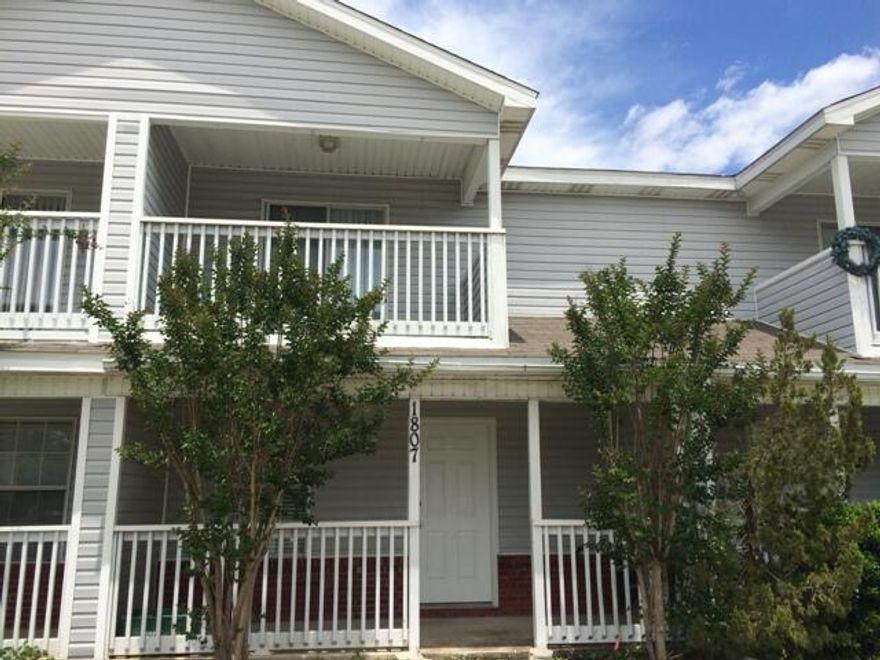 Updated floors and upgraded.  Great location in town, between both bases and minutes to all area amenities.  Tiles on first floor and carpet on stairs and upstairs. Every bedroom has it own balcony and main room have an access door to the upstairs bathroom.  In-line water heater.  Unit come with a stackable washer and dryer, refrigerator, and a dishwasher. Nice and clean unt and quite neighborhood. Text or email listing agent at rstatefl@cox.net