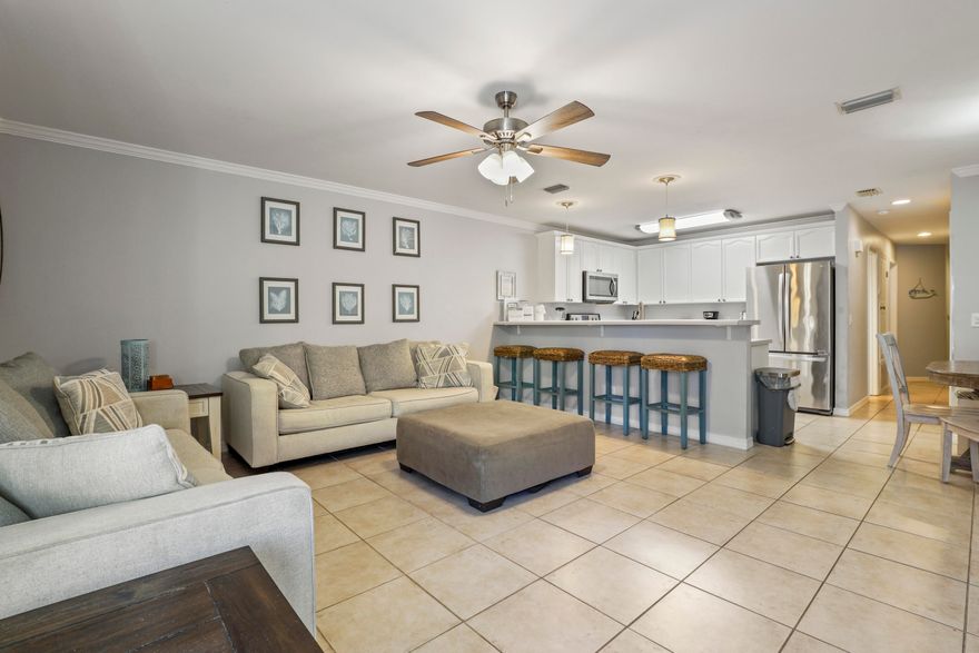 Spacious townhome in the heart of Miramar Beach is a coastal retreat! Updated in coastal decor, the open floor plan creates a great space for gathering. This home boasts three spacious bedrooms & three baths; and the master bedroom features a cozy sitting area and kitchenette. The master ensuite bath offers a deep soaking tub, separate shower and dual vanities. Utilities included are water, sewer, trash removal, internet, and electricity ($175 cap). Just a short walk to the deeded beach access!