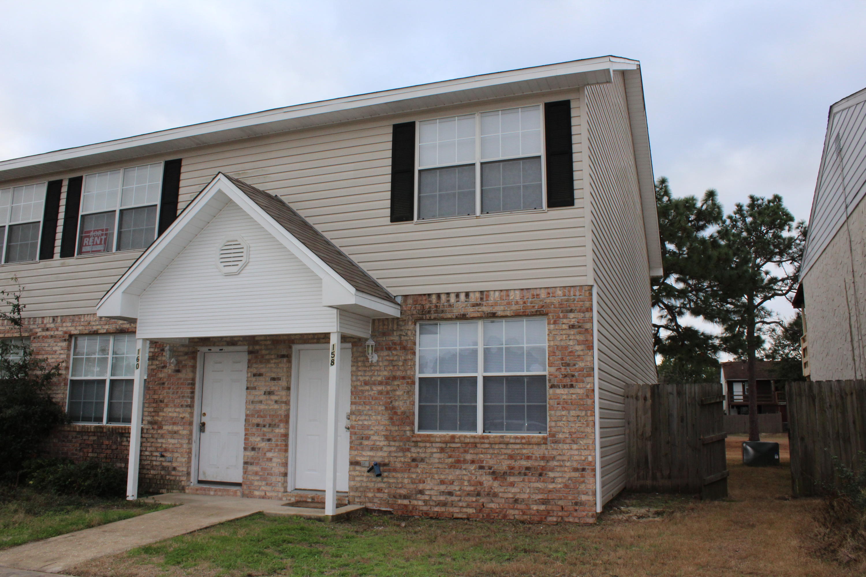 Move-in ready townhome with new HVAC, 2 bedrooms, 1 1/2 baths and 1300 sq feet located in Shalimar, FL! This townhome was built in 2002 and is located close to the beaches, shopping, and restaurants! The kitchen features a built-in microwave, Refrigerator, dishwasher, and oven/stove. The range microwave and refrigerator are approximately 2 years old. The flooring is carpet in the living room and bedrooms and tile in the bathrooms and kitchen. The home features a covered patio overlooking the community pool. The exterior is vinyl siding which is easy to maintain! This would make a great investment property! The HVAC and dishwasher are a few months old! Buyer to verify all dimensions and information!