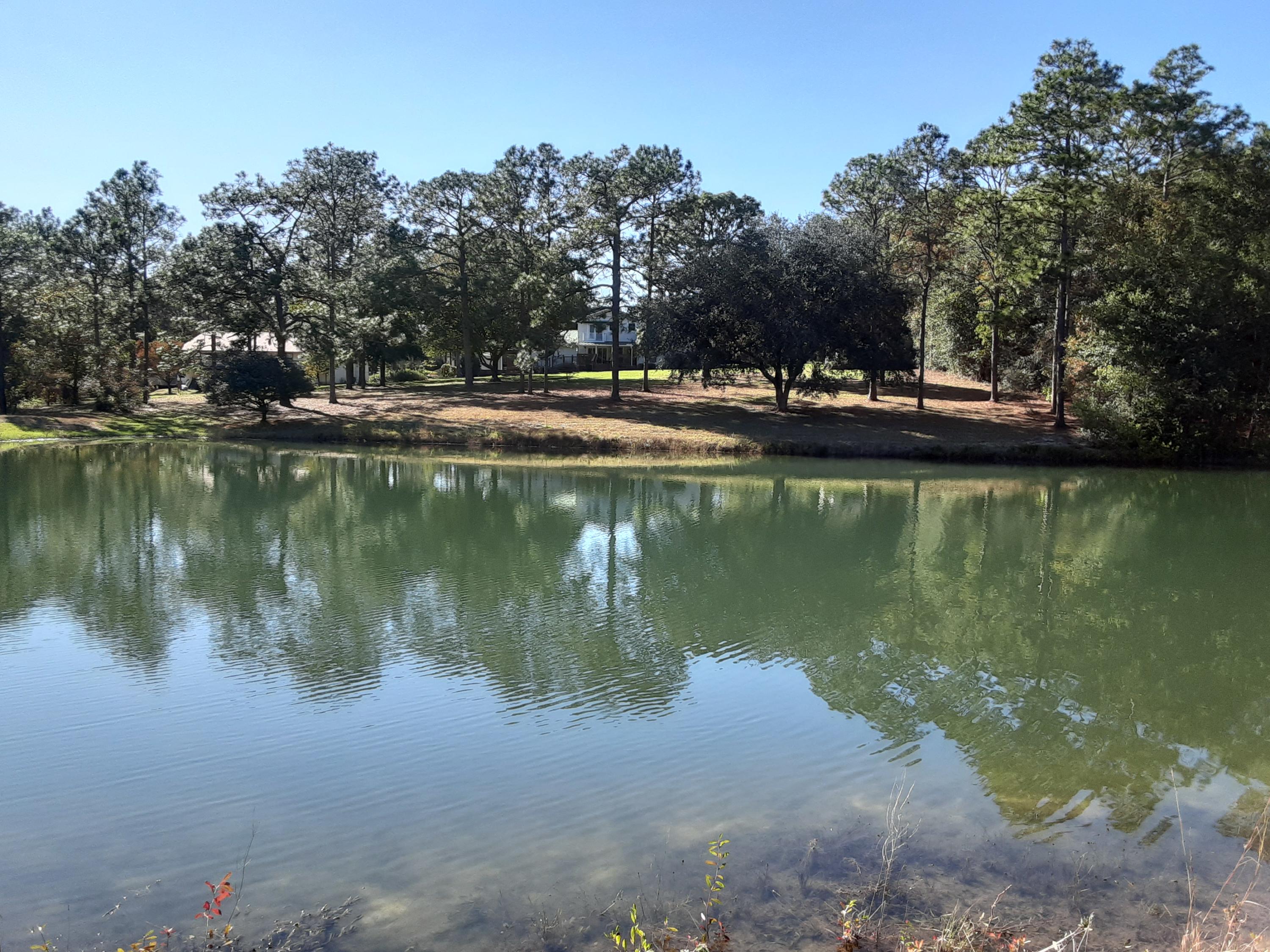 This is a beautiful 2.35 acre lake front lot. Perfect to build that dream home on. It has access to public water, and electric. Come take a look at it....I think you will love it.