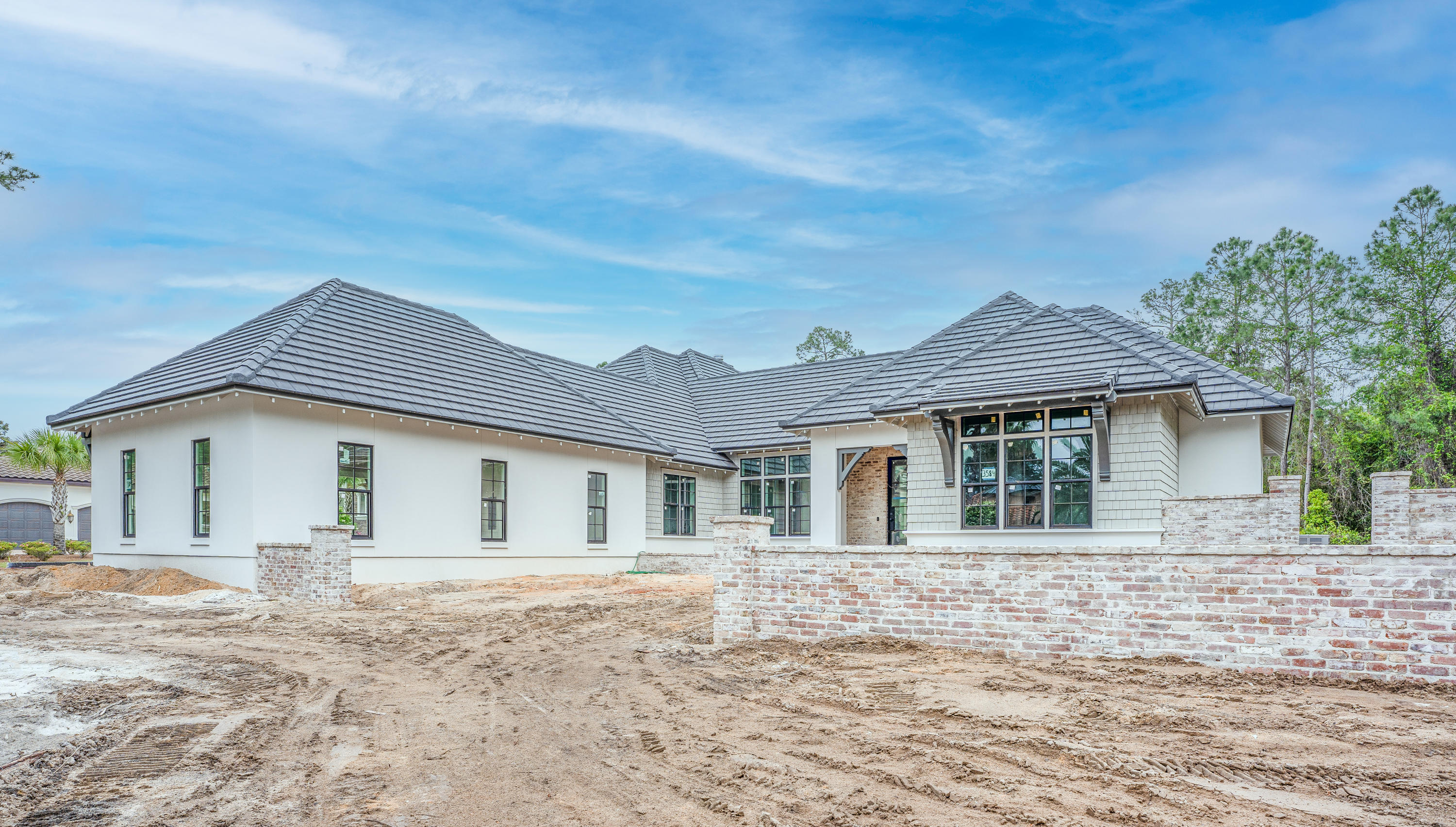 NEW One Story HUFF HOMES OF FLORIDA, HOME UNDER CONSTRUCTION in the Exclusive Gated Community of BURNT PINE AT SANDESTIN GOLF & BEACH RESORT. NEW BURNT PINE One Story Home will have Nearly 4,000 sq. ft. 4 bedrooms 4.5 baths with a Pool, Summer Kitchen and a Large Screened Porch. Private Master Bedroom Suite at One Wing of the House along with an Office. The Other 3 Guest Bedroom will have their Own Private Bath. Open Concept Floor Plan with Hardwood Floors thru the Entire House, High Ceilings, Quartz Counter Tops, Custom Cabinets, Stainless Appliances, 8 Foot Solid Core Doors AND a 3 Car Garage. HOME DETAILS WILL ALSO HAVE BRICK AND SHIP LAP WALLS, And CUSTOM FIREPLACE In Living Room and on the Porch. Gourmet Kitchen will have HIGH END APPLIANCES, Large Center Island and Walk In Pantry.