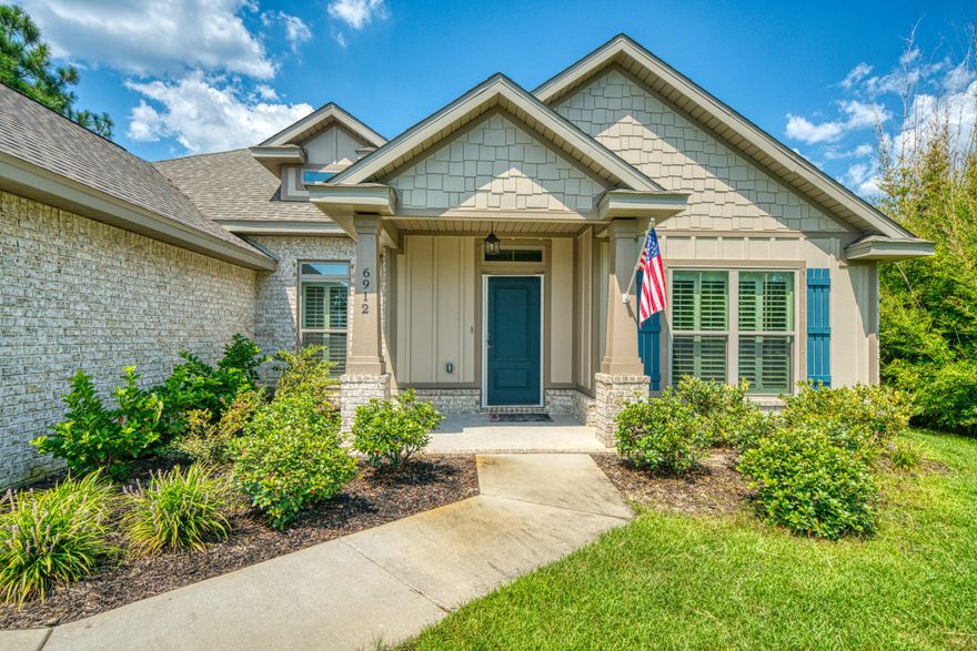 Immaculate Craftsman style brick home built in 2017. This is a desirable floorplan that features an open design with 4 bedrooms and 3 full bathrooms. The front 2 windows feature Plantation shutters and the dining room window has automatic blinds. The split floor plan has the master on one side with a private ensuite. The master ensuite has double vanities, a large soaker tub with tile surround a glass enclosed tiled shower with dbl shower heads (one rainfall). The walk in closet is located off the bathroom and conveniently has a door off the closet to the laundry room. There are 2 bed rooms at the front of the home that share a full bathroom and an additional bathroom at the back of the home with another full bathroom. The large main living area boasts a trey ceiling and recessed lighting.