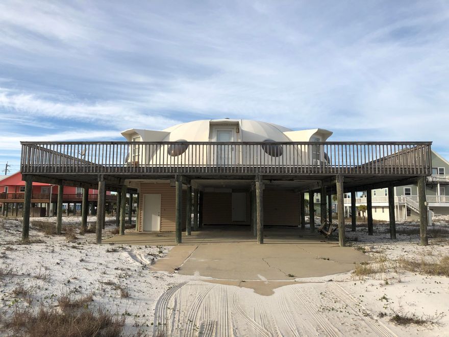 Unique 2 bed/2 bath Home on over 1/4 Acre lot on Gulf Blvd, just down the street from Public Beach Accesses, steps from the Gulf of Mexico's White Sandy Beaches and Emerald Green Shimmering Waters! Home is surrounded by a huge wrap around deck and features tiled flooring, kitchen appliances, and window cooling units. On the ground floor is an additional room and Laundry room. Home is being sold in ''AS IS'' Condition and may need extensive work. This is a great opportunity to have your very own piece of paradise on Navarre Beach, with crowd free beaches, walking and biking trails, Florida's longest fishing pier, parks, Gulf Island National Seashore nearby, adding up to the ultimate in privacy and leisure experiences.