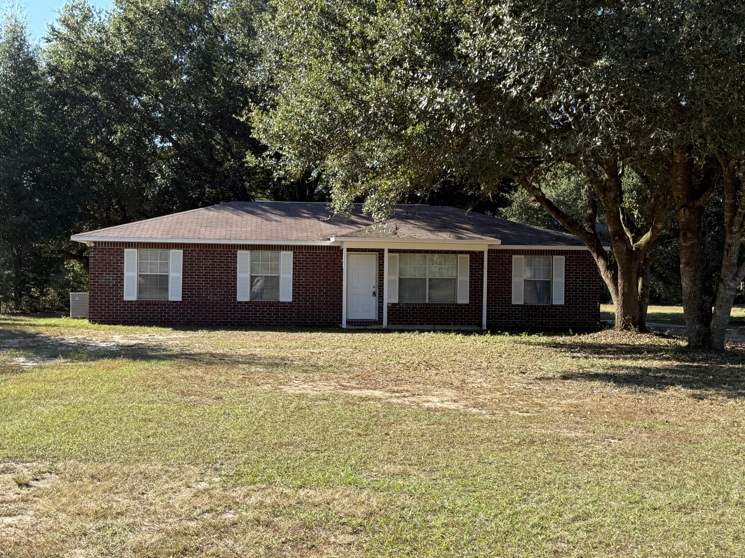 Country living at it best. Almost a full acre with amazing huge Oak Trees. This 3 bedroom 2 bath home is waiting for you. Large 25 X 18 family room is open to the breakfast nook. Kitchen comes with new microwave, side by side frig, smooth top stove, and dishwasher. Large utility room with lots of room for storage. Outside you will find a large shed for additional storage or a man cave.