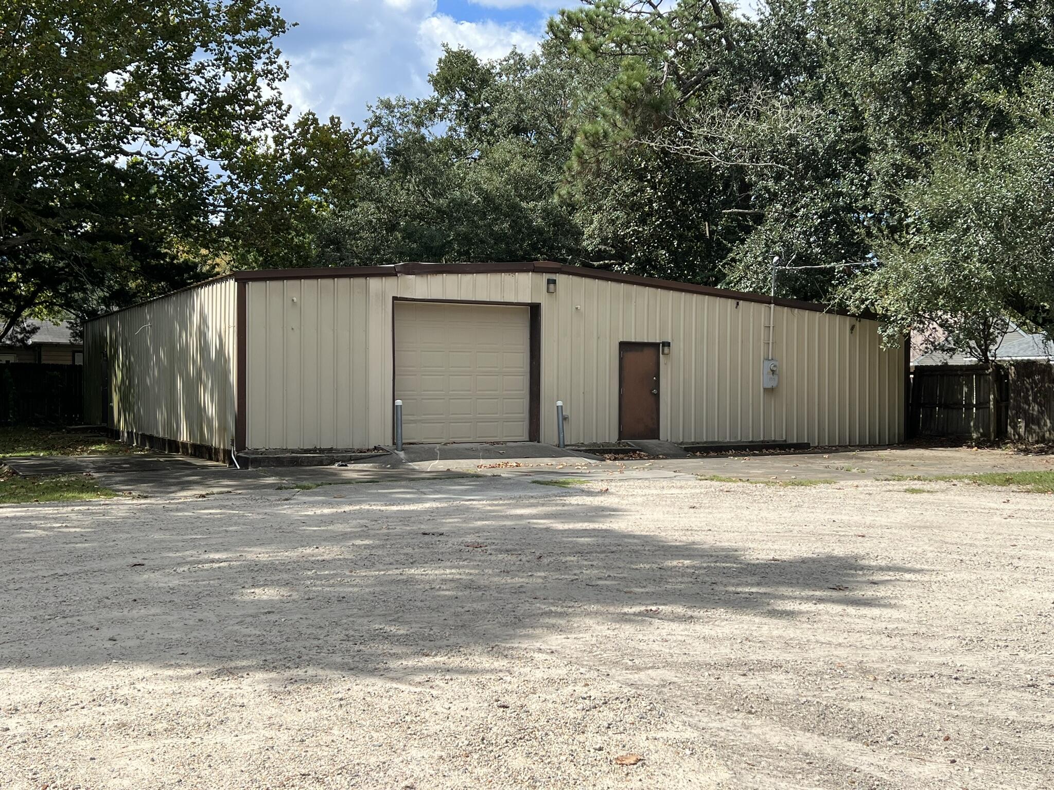 Warehouse / storage building ready to occupy. One roll-up door, 3 personnel doors. Additional yard area possibly available.