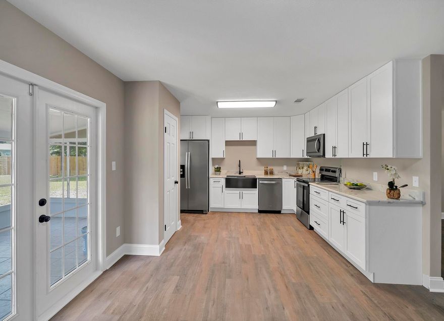 Completely Updated Home ! 3/2 Detached Garage workshop. 2023 Roof, 2019 AC, 2023 Hot Water Heater, New Kitchen, granite, stainless appliances, new paint in and out, new textured ceilings, new lights and fans, updated baths, new flooring...Textures ceilings, etc..... 90k rehab spent ....