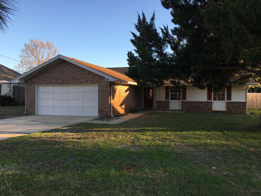 Come check out this wonderful 4 bedrooms 2 bathroom home conveniently located close to Destin Elementary. Enjoy the air conditioned/heated sun room and formal dining room/family room area. Amazing fenced in backyard with air conditioned storage/workshop