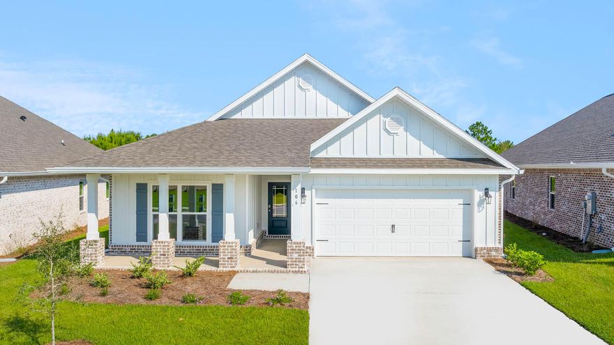 Welcome to the 80 Gray Owl Drive W, a new home at Owl's Head Farms in Freeport, Florida. This home is move in ready and has a large covered front porch.  The front entry hallway leads to a light-filled open-concept living area with 9' ceilings. The kitchen impresses with quartz countertops, undermount single basin sink and a dedicated water filter faucet. stainless steel appliances, and a large center island with bar seating overlooks the great room. Brushed nickel fixtures are throughout the home and include a lifetime warranty.  Adjacent to the kitchen is the dining area perfectly positioned for meals and gatherings, while the living room's wide layout invites relaxation and socializing.