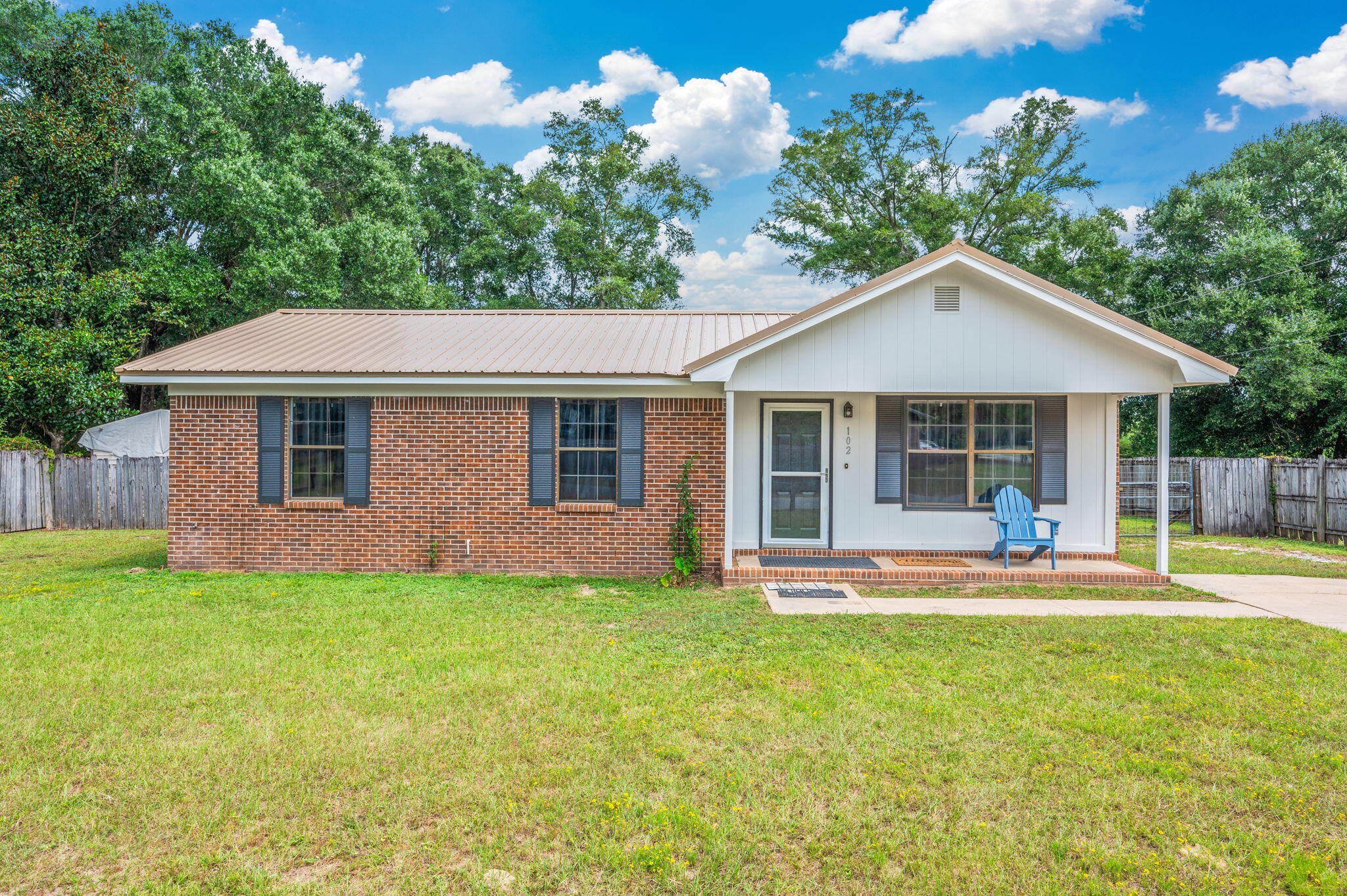 Charming 3 bedroom, 1.5 bath brick ranch on a third of an acre in DeFuniak Springs. With 1,100 sq ft of living space, this solid home has already had the major updates completed, including a new metal roof, new HVAC system, and updated electrical. All that's left are your personal cosmetic touches to make it your own! The classic brick exterior and functional floor plan provide lasting appeal, while the spacious yard offers room for outdoor living, gardening, or play. Whether you're a first-time buyer, looking to downsize, or seeking a smart investment, this property is a great choice. Conveniently located with easy access to schools, shopping, and downtown DeFuniak Springs, this move-in ready home blends peace of mind with endless potential.