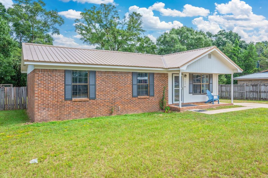 Charming 3 bedroom, 1.5 bath brick ranch on a third of an acre in DeFuniak Springs. With 1,100 sq ft of living space, this solid home has already had the major updates completed, including a new metal roof, new HVAC system, and updated electrical. All that's left are your personal cosmetic touches to make it your own! The classic brick exterior and functional floor plan provide lasting appeal, while the spacious yard offers room for outdoor living, gardening, or play. Whether you're a first-time buyer, looking to downsize, or seeking a smart investment, this property is a great choice. Conveniently located with easy access to schools, shopping, and downtown DeFuniak Springs, this move-in ready home blends peace of mind with endless potential.