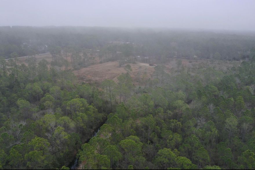 Just a few short miles to the beaches this 10 acre property is near the Choctawhatchee Bay with a canal leading to Bayou/Bay on property.Great for a builder or to build your dream home. Plenty of room for pool, stables and horses or multiple builds.|
