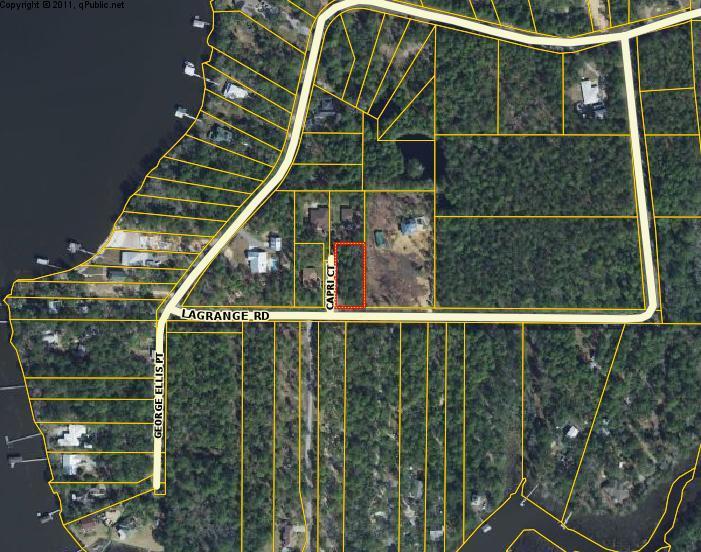 Beautiful and secluded, 0.5 Acre corner lot off of Lagrange Rd. Conveniently outside of flood zone lines, no flood insurance required. Original plot map available upon request. The lot is currently zoned as rural village. It is not held by a Homeowners association, no HOA dues!