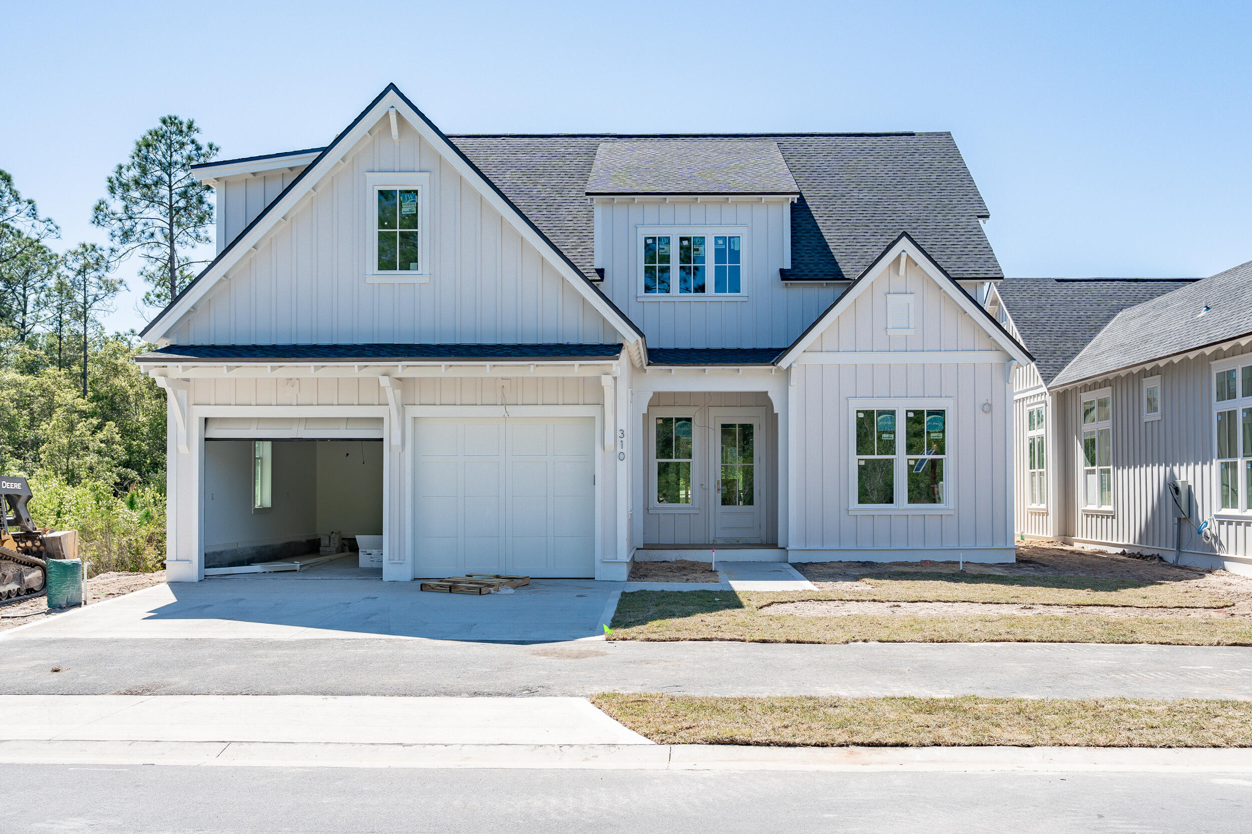 ALMOST MOVE-IN READY- Expected completion is June '24!Located in the Pines neighborhood of the Watersound Origins community on Lot 2, a serene lot with a private pool/spa package, plus a cabana with a fireplace, creates a perfect recipe for your own private oasis. The Suffolk plan by Romair boasts 10' ceilings upstairs and downstairs while spanning an impressive 3,107 sq ft. As you enter through the two-story foyer, you'll immediately be captivated by the grandeur and elegance of this home. This stunning plan features 4 bedrooms and 4.5 bathrooms., plus a 24'x17' bonus room above the 2-car garage, perfect for a home office, media room, gym, or additional living space. The open concept design of the great room, dining area (with bench seating), and living room