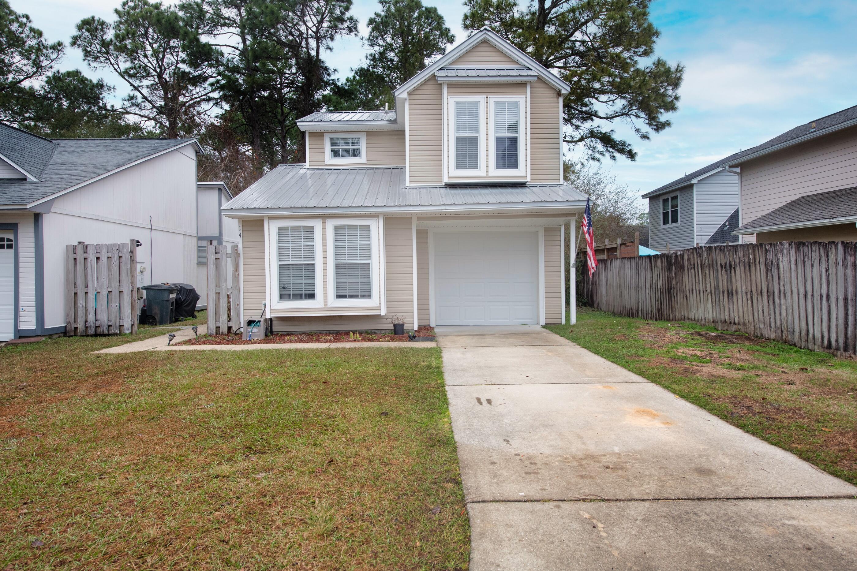 Welcome to this gorgeous remodeled home located minutes from Eglin AFB and close to the beautiful beaches of the Emerald Coast! When entering the home one is met by a cozy Livingroom with fireplace along with a dining room area, in the kitchen one can find stainless steel appliances and granite countertops. primary bedroom is located conveniently on the first floor with on suite bathroom while the other two bedrooms and bathroom are located on the second floor. the home offers carpet in the bedrooms and LVP flooring in the other areas. Stepping out from the sliding glass doors one will find the well sized fully fenced backyard ready for your summer gatherings. All plumbing in the home has been recently redone. schedule your showing today!