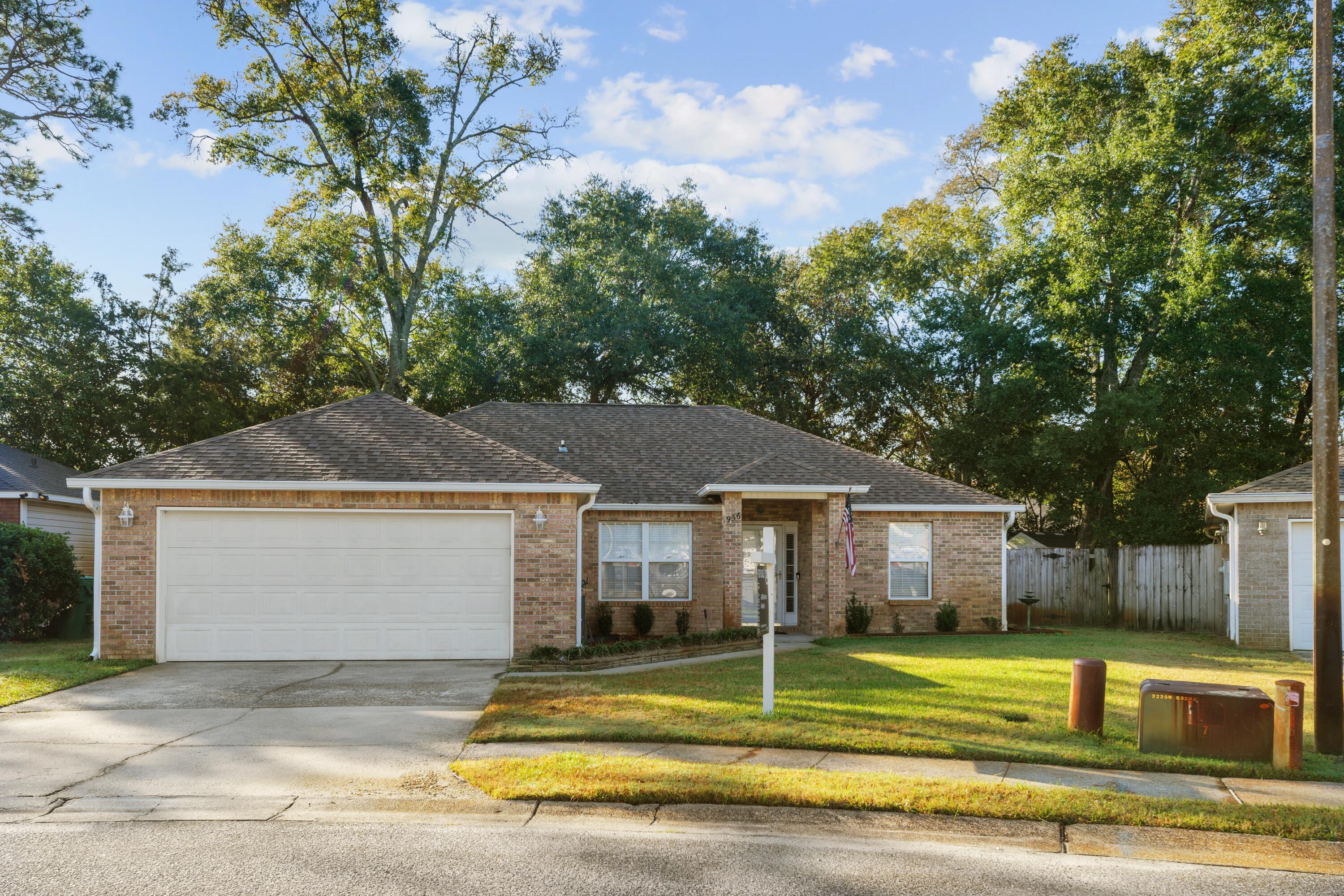 Discover this beautiful 3-bedroom, 2-bathroom home in central Fort Walton Beach with easy access to Beal Parkway, shopping, dining, and both military bases.   Step inside to a spacious living/dining combo room featuring wood-look tile and LVP flooring throughout, with an elegant trayed ceiling. The heart of the home, the full eat-in kitchen, includes stainless steel appliances, a pantry, backsplash, and a breakfast bar, all enhanced by upgraded countertops.The split bedroom floor plan ensures generous living areas and privacy for each bedroom, creating a perfect blend of open space and personal retreats. The master bedroom is a true sanctuary, with tray ceilings and access to the screened in back porch.  The master bathroom includes a walk-in closet, double vanity, garden tub, and a  large walk-in stall shower. The rest of the interior includes two additional well-sized bedrooms, another fully renovated bathroom, and a dedicated laundry room, all of which were designed for style and functionality.
Outside, a large screened-in patio overlooks a backyard enclosed by a full privacy fenceperfect for relaxing or entertaining friends and family!
Don't miss your chance to make this house your home. Schedule a viewing today and prepare to be captivated by this charming property
