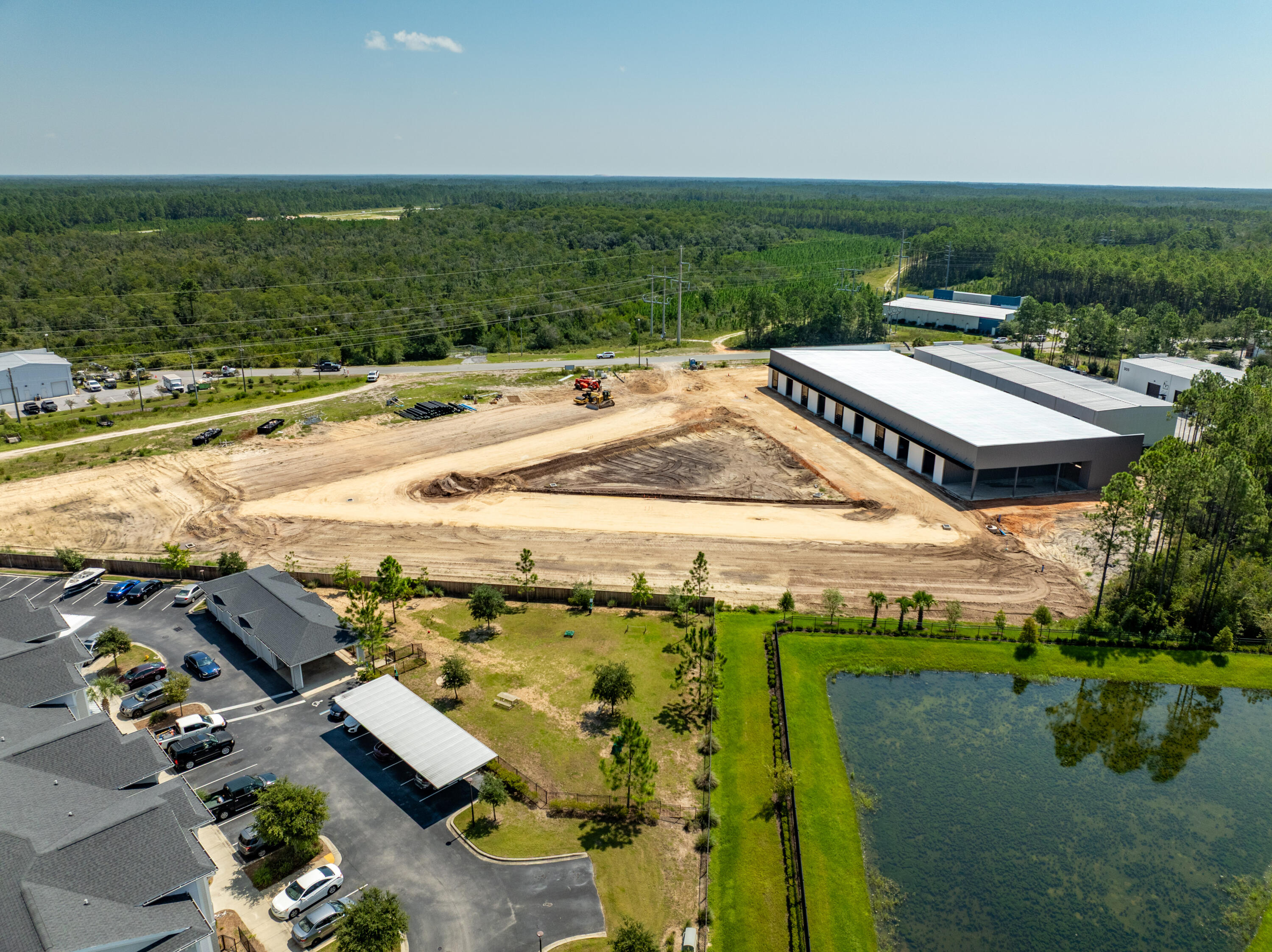 ~10,400 square feet of a total ~25,430 square foot freestanding building in St. Joe's South Walton Commerce Park of the flourishing Santa Rosa Beach, Florida market. This 10,400 square foot space offers storefront glass, large roll-up door, and a loading dock for convenient logistics and receiving. St. Joe's Watersound Origins and 'Bay-Walton Sector Plan' involves 20,000+ rooftops of residential density in proximity to this new development and space. The site plan is uploaded to this listing. This subject new development project involves Walton County, Florida parcels: 05-3S-18-16010-000-0050 AND 05-3S-18-16010-000-0060. Occupancy should be achievable by October 1, 2025.