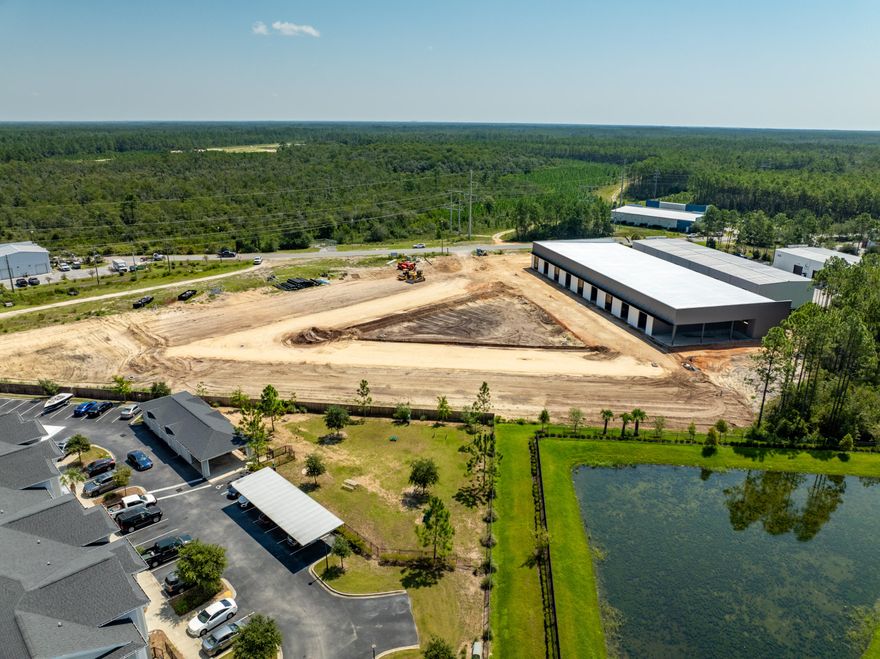 ~10,400 square feet of a total ~25,430 square foot freestanding building in St. Joe's South Walton Commerce Park of the flourishing Santa Rosa Beach, Florida market.  This 10,400 square foot space offers storefront glass, large roll-up door, and a loading dock for convenient logistics and receiving.  St. Joe's Watersound Origins and 'Bay-Walton Sector Plan' involves 20,000+ rooftops of residential density in proximity to this new development and space.  The site plan is uploaded to this listing.  This subject new development project involves Walton County, Florida parcels: 05-3S-18-16010-000-0050 AND 05-3S-18-16010-000-0060.  Occupancy should be achievable by October 1, 2025.