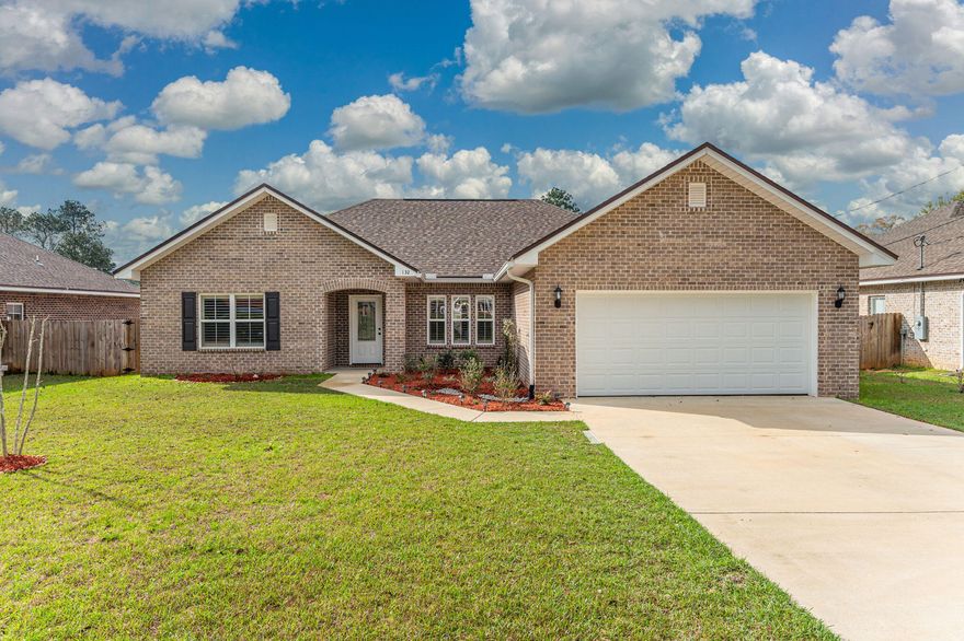Welcome home to this all brick home with open concept floor plan on a completely level lot. As you walk into the front door, you will notice the dinning room to your right and large foyer. You will instantly fall in love with the 9 ft ceilings throughout with trey ceilings and double crown moulding. Home has upgraded plantation shutters throughout. Floors are vinyl plank with ZERO carpet. Home has beautiful granite counter tops throughout. Kitchen has all wood cabinets and soft close drawers, stainless steel appliances, and a large pantry. Enjoy the recessed lighting and floor plug located in the living area. Master bathroom has custom tiled shower with bench and rain-head with additional sprayer.  Master bath has a separate 6 ft garden tub for relaxing. Back patio is covered and overlooks a large privacy fenced backyard. Don't miss out on this one!