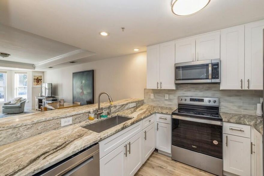 This ground-floor unit is located in the heart of Destin just one minute from the Destin Executive Airport!  This updated unit includes granite countertops, new Mission-style cabinetry, custom tile backsplash, stainless-steel appliances, new bathroom vanities & crown molding! The two-level security system allows guests to be buzzed into the building entrance & then must be approved by condo resident.....this feature creates a sense of safety & security. Bay window provides lots of natural light and creates a sense of space in the living area!  Unit is all electric! New Publix grocery in the neighborhood on Main Street!  Great parking around the unit--parking not assigned.  Units may be leased 30 days or longer per Rules & Regulations.