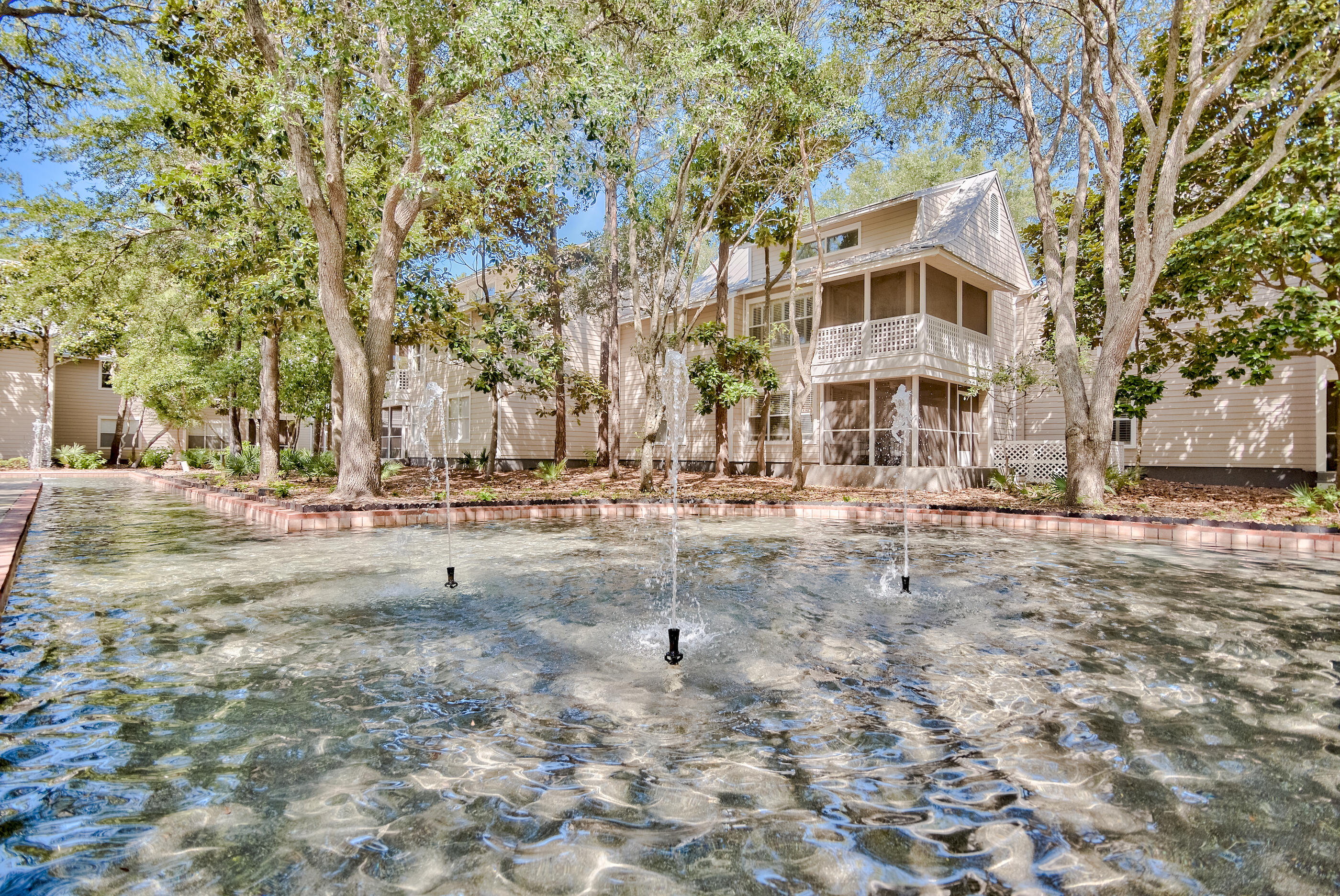 Located in a gated community with private deeded beach access, this beach cottage is full of character, charm, and quality craftsmanship throughout.Step into an open-concept living space that's both functional and inviting. The living room is anchored by timeless built-in cabinetry and classic millwork, creating a warm and welcoming atmosphere.Enjoy the benefit of expanded square footage--the former balcony has been enclosed and reimagined as a bright, airy dining area, effectively doubling your usable living space and offering the perfect spot to relax or entertain year-round.The bathrooms have been elegantly remodeled, with tasteful updates that complement the home's coastal character. Additional custom touches include a built-in laundry closet crafted from rich Philippine mahogany, showcasing the attention to detail throughout.
This thoughtfully designed cottage blends style, comfort, and coastal living all within an amenity-rich, secure beachside community.
Hidden Dunes is truly a hidden gem more peaceful and less crowded than many neighboring communities. This gated beachfront retreat offers a wide array of resort-style amenities, including a professionally staffed tennis center with six Rubico Clay Courts,3 new Pickleball Courts, seasonal beach tram service, a lighted basketball court, three swimming pools, BBQ grilling areas, and reflecting pools with flowing fountains. Enjoy scenic walking trails, lush landscaping, and the peace of mind that comes with 24-hour security.