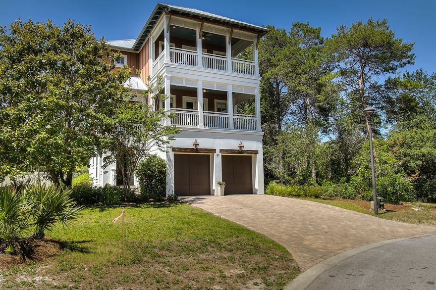 Inlet Beach 4bd/3.5ba home located in a cul-de-sac, just a few minutes from the Gulf of Mexico and the neighborhood dock on Lake Powell! The Archiscapes featured Summerhouse home was built in 2008 with beautiful details including custom wood flooring, plenty of closet space and a lovely backyard! Would make for a great primary residence with 2 car garage and extra storage space on each level. The 2nd level of the home features an open floorplan with the kitchen, dining, living and balcony space flowing together. The large kitchen island connects the kitchen and dining room space. Stainless steel applicance throughout the kitchen including a decretely built-in microwave at the end of the island. Granite countertops and custom cabinetry complete the kitchen designed for entertaining