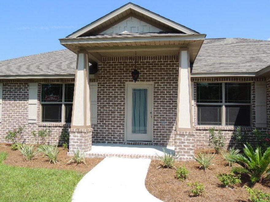 This NEW BEAUTIFUL HOME IS UNDER CONSTRUCTION! Beautiful Natches III at 1597 Oakhill Rd, Gulf Breeze, FL! Some of the wonderful features of this beautiful home are**Covered front entry with beveled glass front door, 4th bedroom has French doors opening to foyer, can also be utilized as office/study. Tile in foyer, kitchen, breakfast nook, baths. Great Room has vaulted ceilings, display niche, and plant ledges. Fantastic Kitchen with Solid Wood Raised Panel Cabinets, Dishwasher, Self-clean Oven, Smooth Top Range; plus, built-in Microwave Hood. ***Granite Countertops with under mount sinks in kitchen and baths. Vaulted Ceiling in Great Room, 5 1/4'' Base Boards, Plant Ledge. Knockdown Ceilings. Air/Air Heat Pump, Ceiling fans in Master Bedroom and Great room.