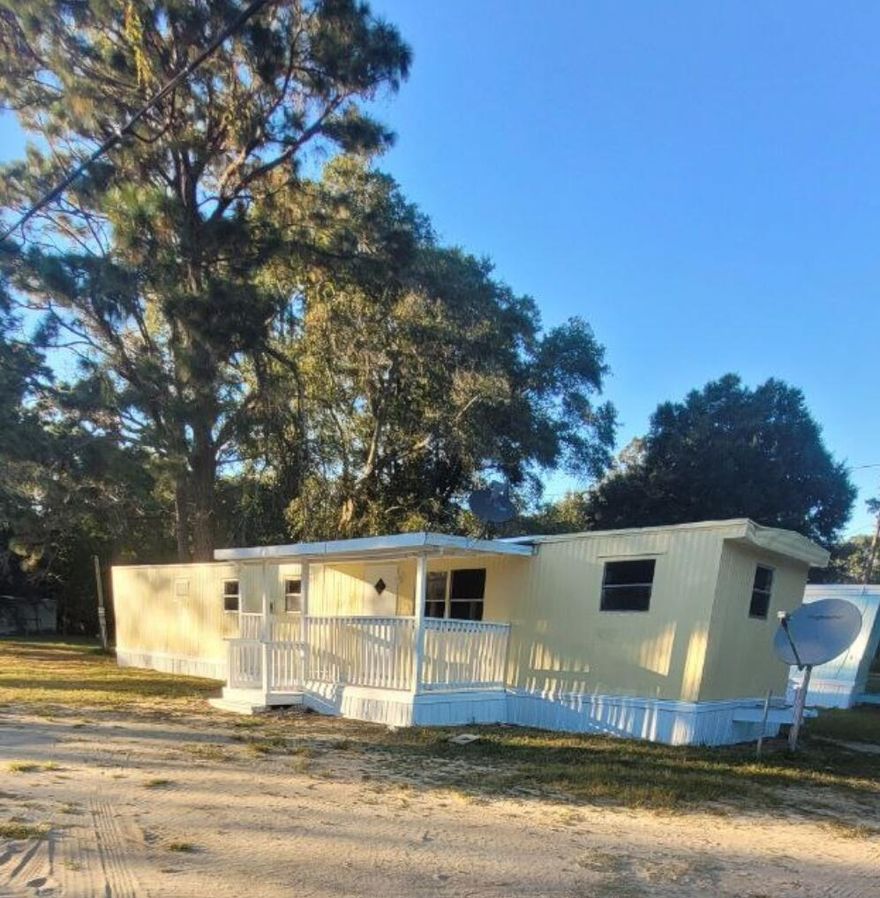 Remodeled down to the studs. Everything is brand new in this mobile home! Paint, floors, tub, cabinets,   countertops, etc. Big open porch on the front